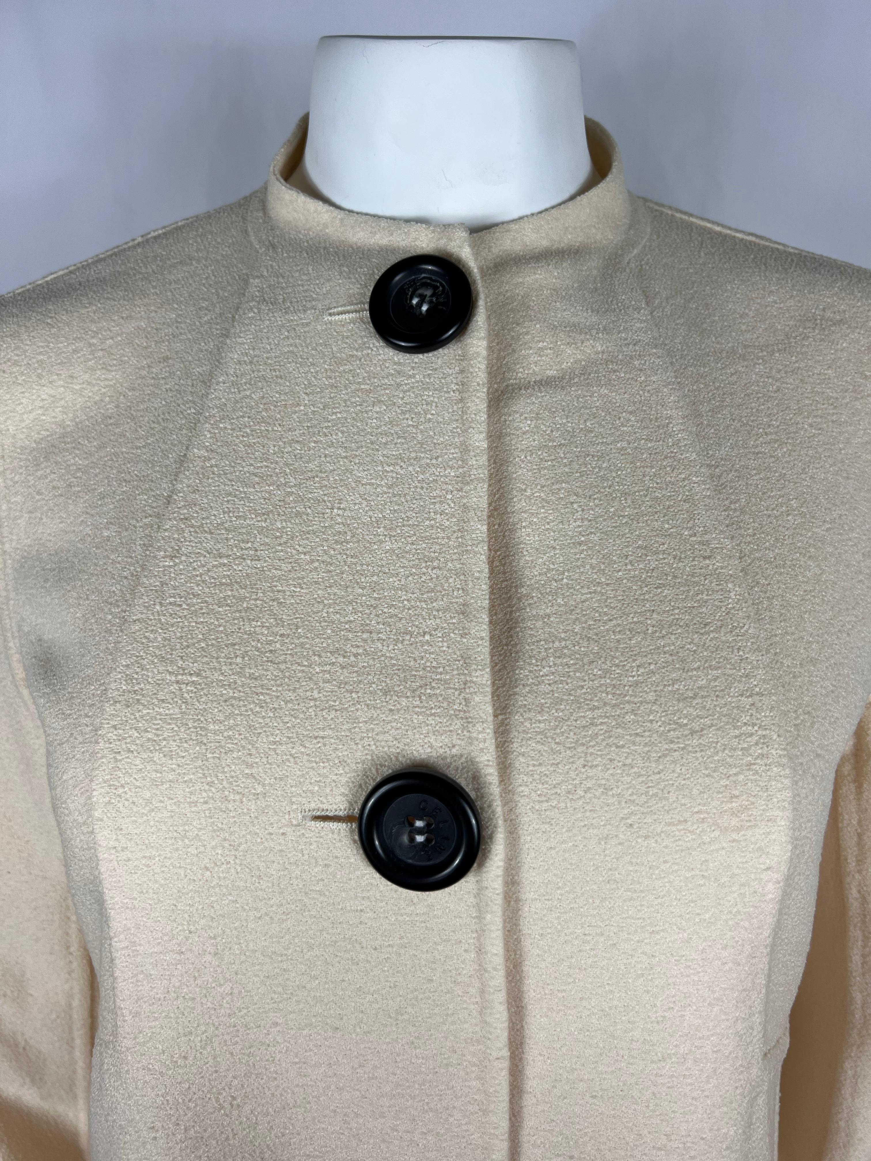 
Celine Coat Jacket, Size Small
• Long sleeves
• Crew neck
• Front large buttons closure
• Side pockets
• Mid length
• Missing tags

Item details:
A casual between-season coat by Celine. Has an uncomplicated fitted silhouette with perfect Celine’s