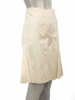 Knielanger Rock von Celine in Creme mit Pantoletten Größe S