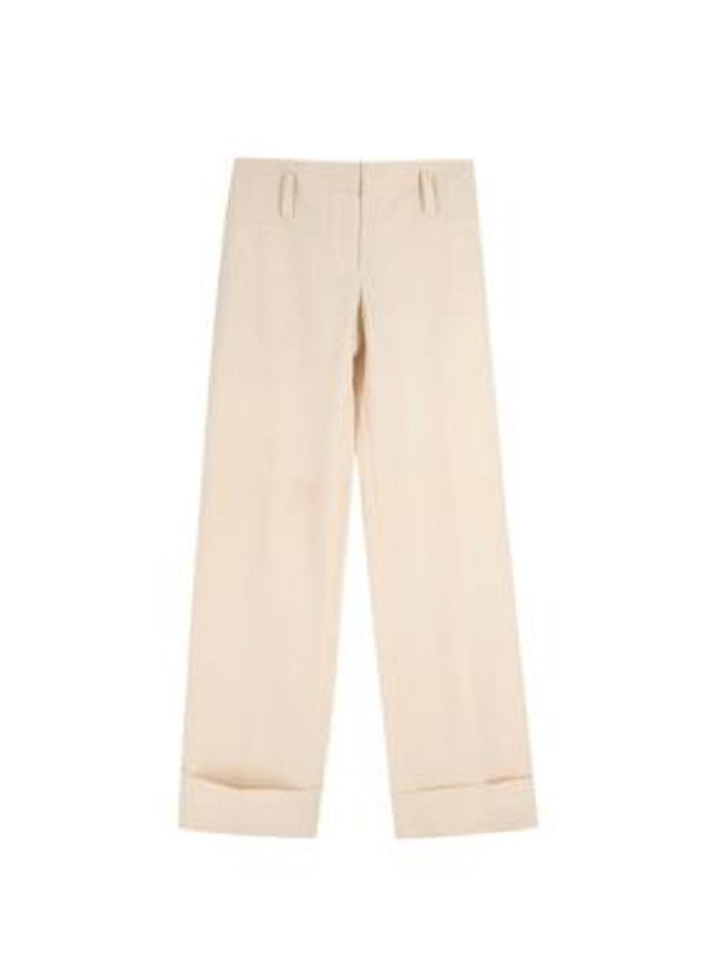 Celine Cream Wide Leg Cuffed Tailored Trousers

- Hook and zip fastening
- Belt loops
- Two buttoned rear pockets
- Folded up hems

Material
The care label has partially been cut off, but the main composition is wool

Made in France

PLEASE NOTE,