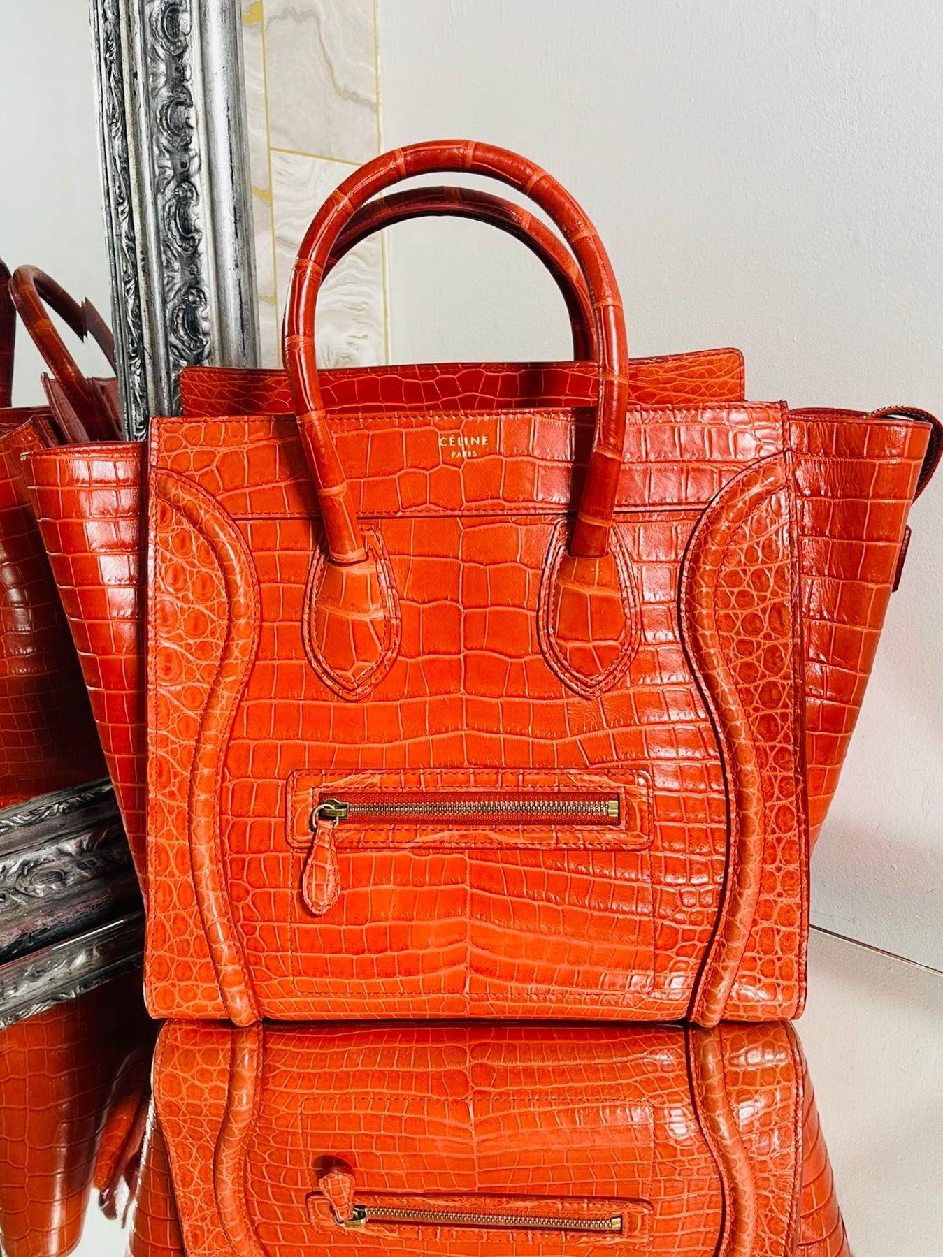 Celine Crocodile Skin Luggage Bag

Orange shiny Crocodile skin with gold hardware. Luxury tote bag with sturdy top carry handles and detailed stitching. Leather interior.

Additional information:
Size – 39 W x 13 D x 28 H cm
Composition- Crocodile