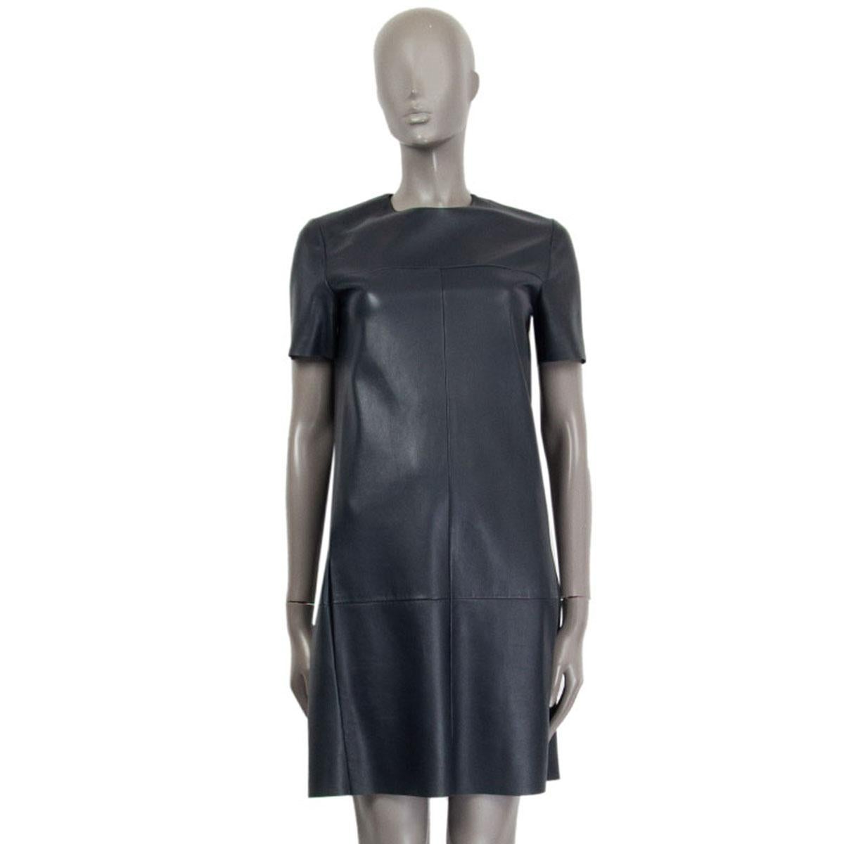 authentic Celine short sleeves shift dress in pigeon blue lambskin leather (100%) with round neck-line and seams detail at the front. Closes with a zipper on the back and has slit pockets at the front hips. Unlined. Has been worn and is in excellent