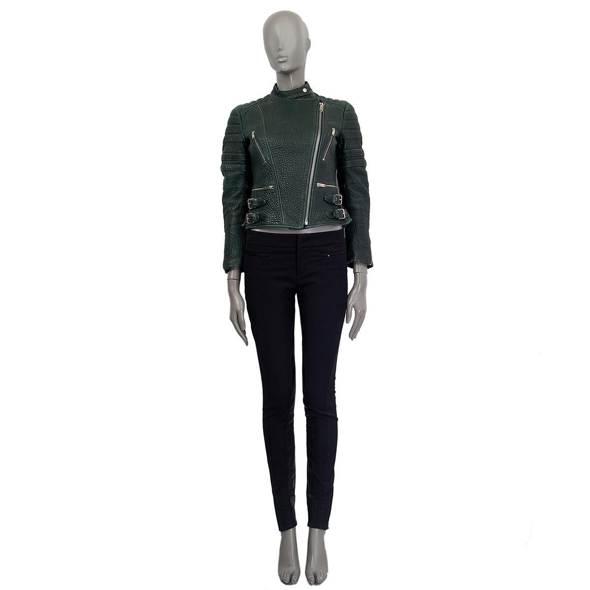 authentic Céline biker jacket in deep green lamb leather with four front zipper pockets and four side buckle details. Closes on the front with a zipper. Lined in viscose. Sings of worn out leather on right sleeve, otherwise it is in good condition.