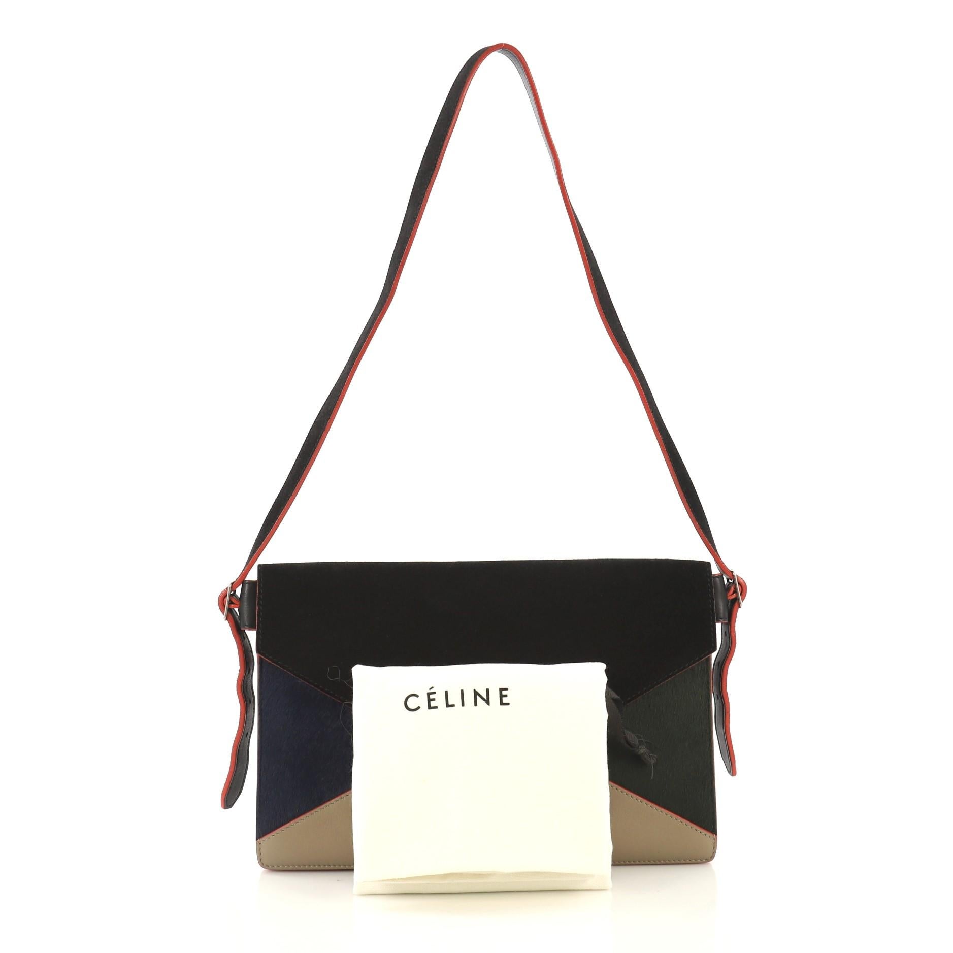 This Celine Diamond Shoulder Bag Pony Hair and Leather Medium, crafted from blue and green pony hair, black suede, and beige and black leather, features an adjustable strap, exterior zip back pocket, and silver-tone hardware. Its press-lock closure
