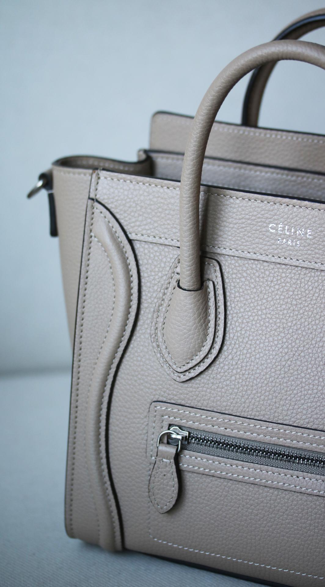 Céline Nano luggage bag in drummed calfskin. Leather handles and removeable shoulder strap. Zip closure. Zipped outer pocket on the front. Silver-tone metal hardware. Colour: Taupe. 100% Calfskin. Lining: 100% calfskin. Does not come with a dustbag.