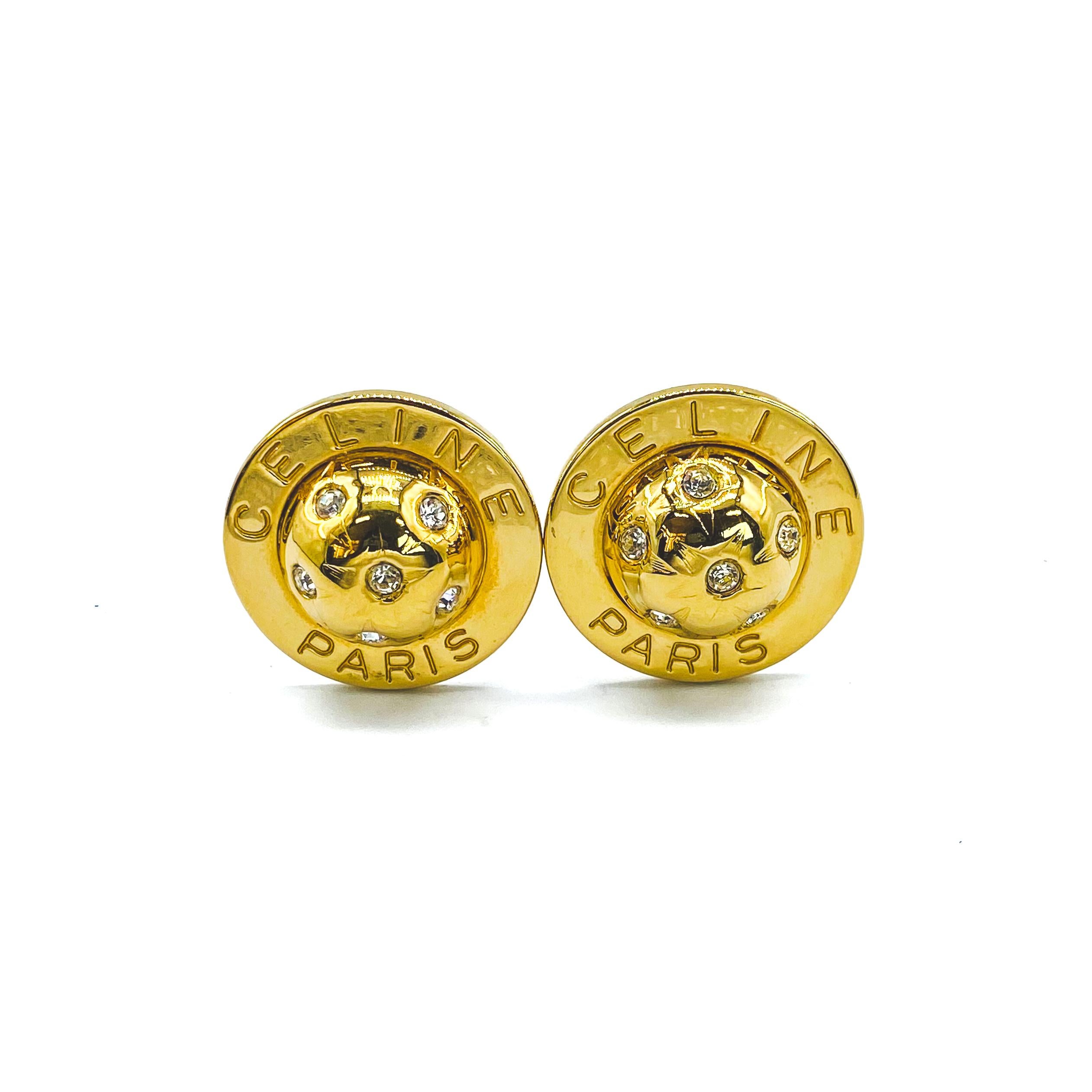Celine Vintage 1990s Clip On Earrings

Iconic globe statement earrings from the 90s archive

Detail
-Made in Italy in the 1990s
-Crafted from gold plated metal
-Iconic globe design set with rhinestones surrounded by the Celine logo

Size &