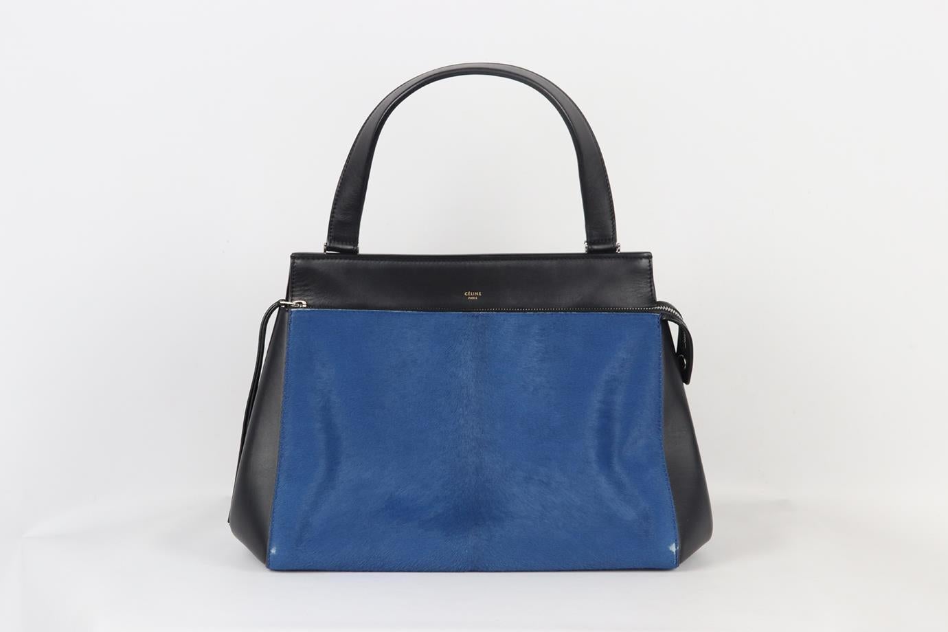 Celine Edge Medium Calf Hair And Leather Shoulder Bag. Blue and black. Zip fastening - Front. Does not come with - dustbag or box. Height: 10.4 in. Width: 6.5 in. Depth: 8.5 in. Handle drop: 6.5 in. Condition: Used. Very good condition - Some wear