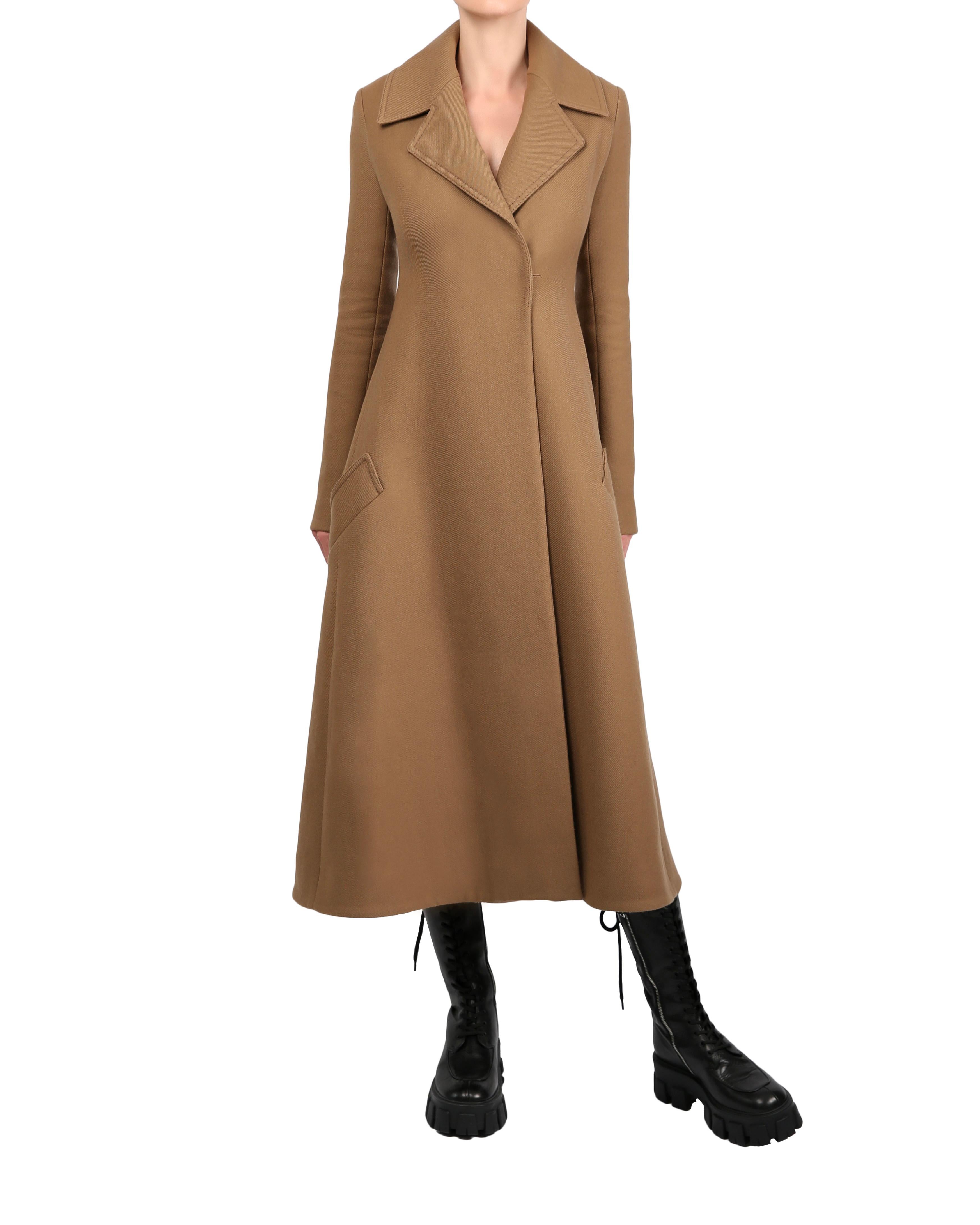 Celine Fall 2014 gabardine wool coat in camel by Phoebe Philo 
Fit and flare style coat with oversized collar and two large slanted pockets to the front 
Midi length, though please take note of the measurements as this coat has been modelled on a