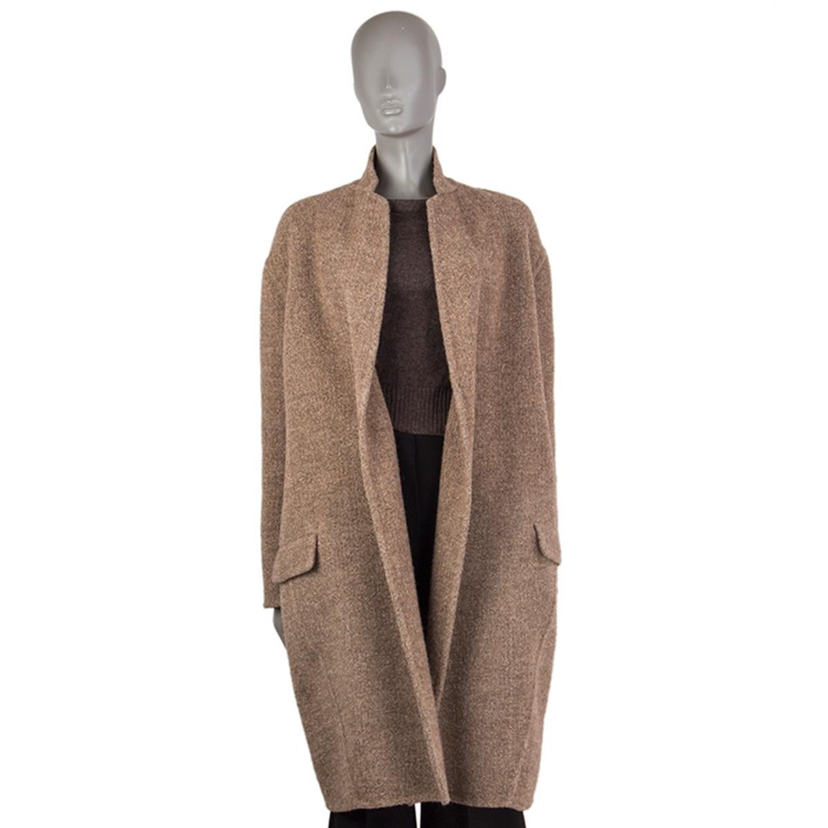 100% authentic Celine open cocoon coat in fawn and beige lama hair (77%), nylon (20%), and wool (3%). With narrow notch collar and two flap pockets on the sides. Sleeves lined in black silk (100%). Has been worn and is in excellent condition.