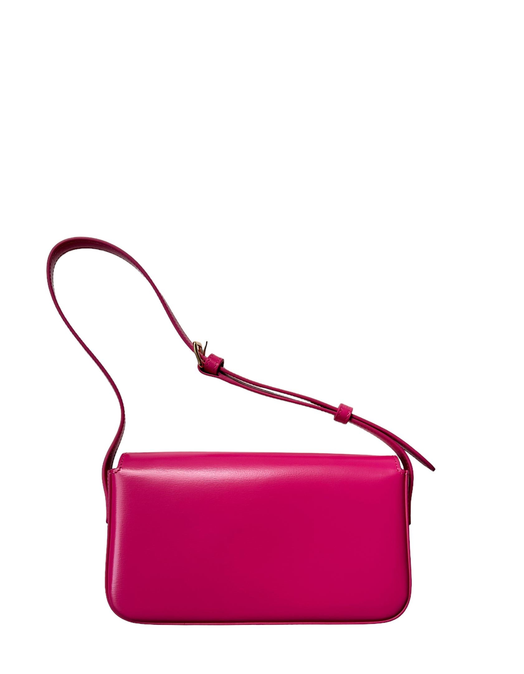 Celine Fuchsia Pink Shiny Calfskin Triomphe Shoulder Bag

Made In: Italy
Year of Production: 2023
Color: Fuchsia
Hardware: Goldtone
Materials: Shiny calfskin leather
Lining: Pink leather
Closure/Opening: Flap top
Exterior Pockets: None
Interior