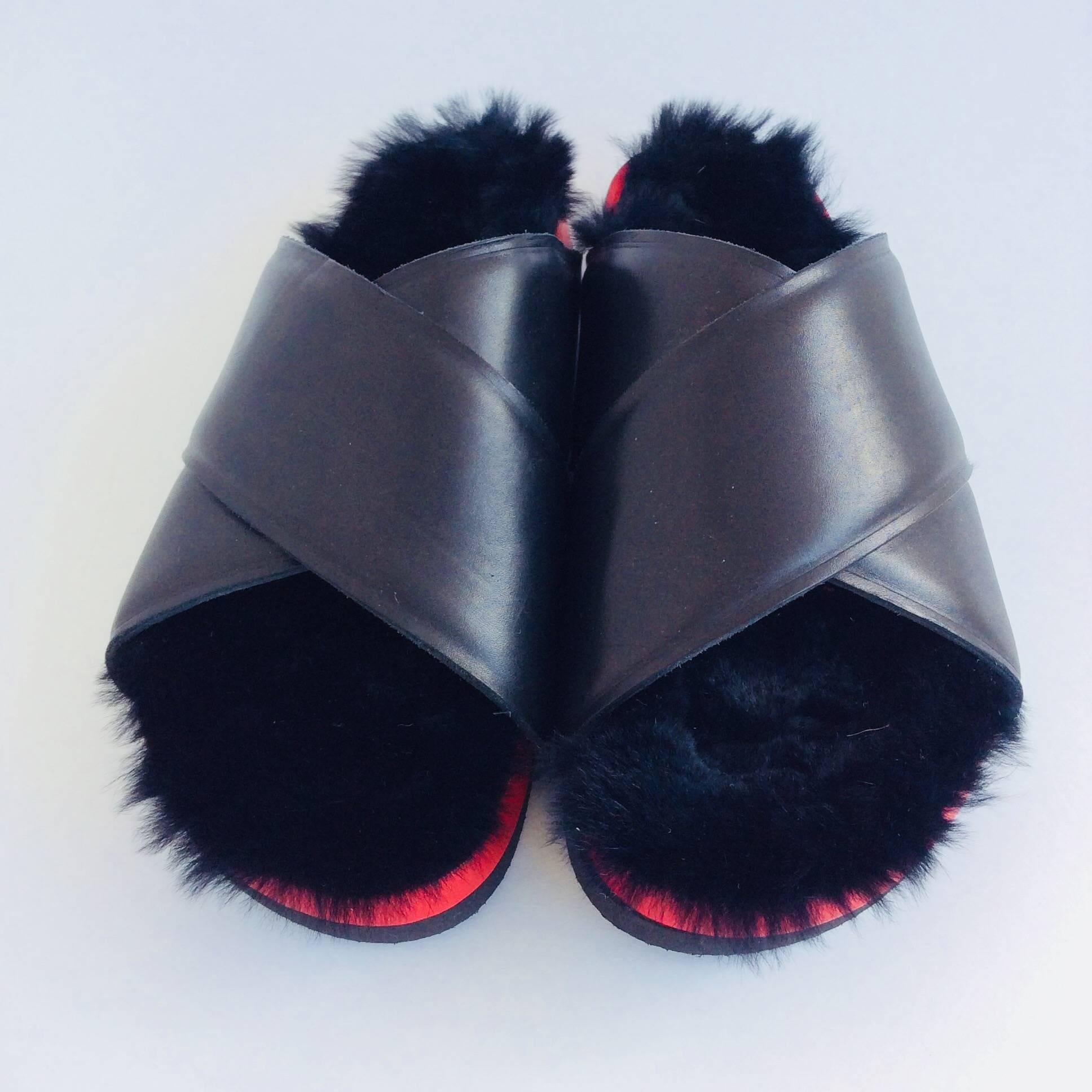 Celine fur-lined black leather slides with red platforms. 

Sizing: Fr37, Us7

Platform height: 1.5 inches