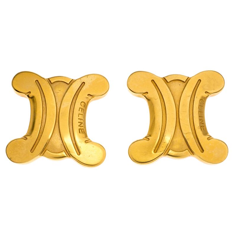 These stud earrings from Celine are sure to brighten your heart. They bring a design of the brand's logo in gold-tone metal enhanced with engravings. The earrings are sure to add the luxury touch on any occasion.

Includes:Original Dustbag
