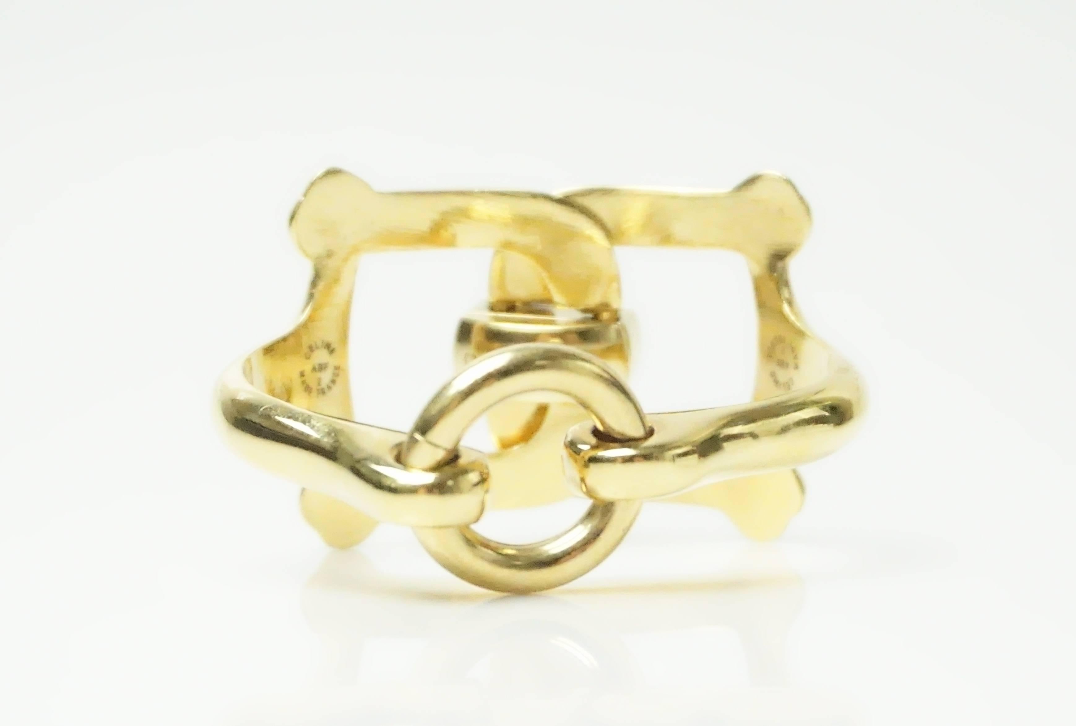 Celine Goldtone Horsebit Bracelet - This very beautiful and iconic piece makes a beautiful fashion statement. The item is in excellent condition.

Measurement:
Depth 1.75