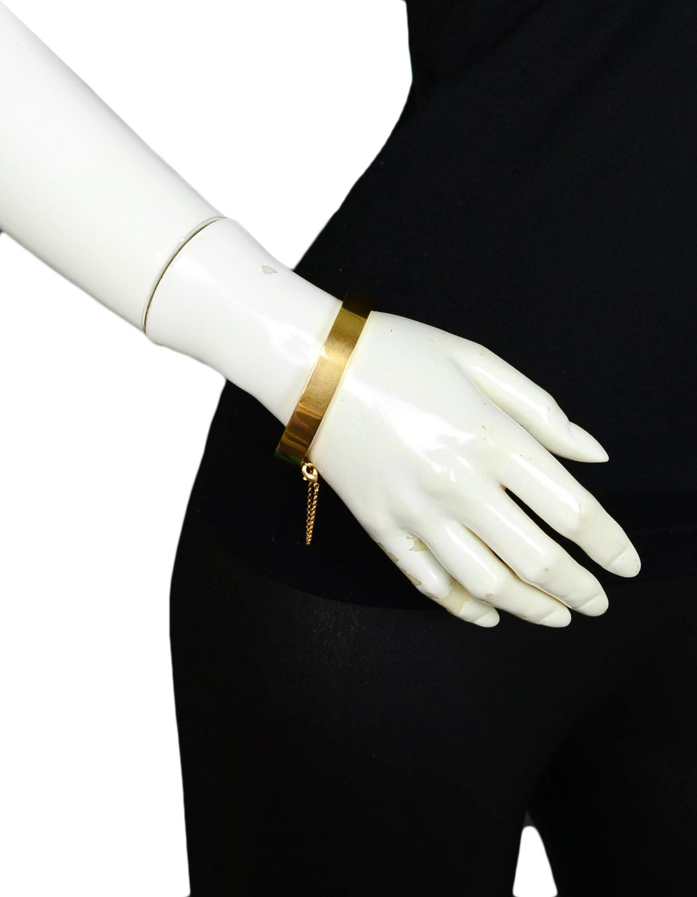 Celine Goldtone Narrow Manchette Cuff Bracelet 

Made In: Italy
Color: Goldtone
Materials: Metal
Hallmarks: 
