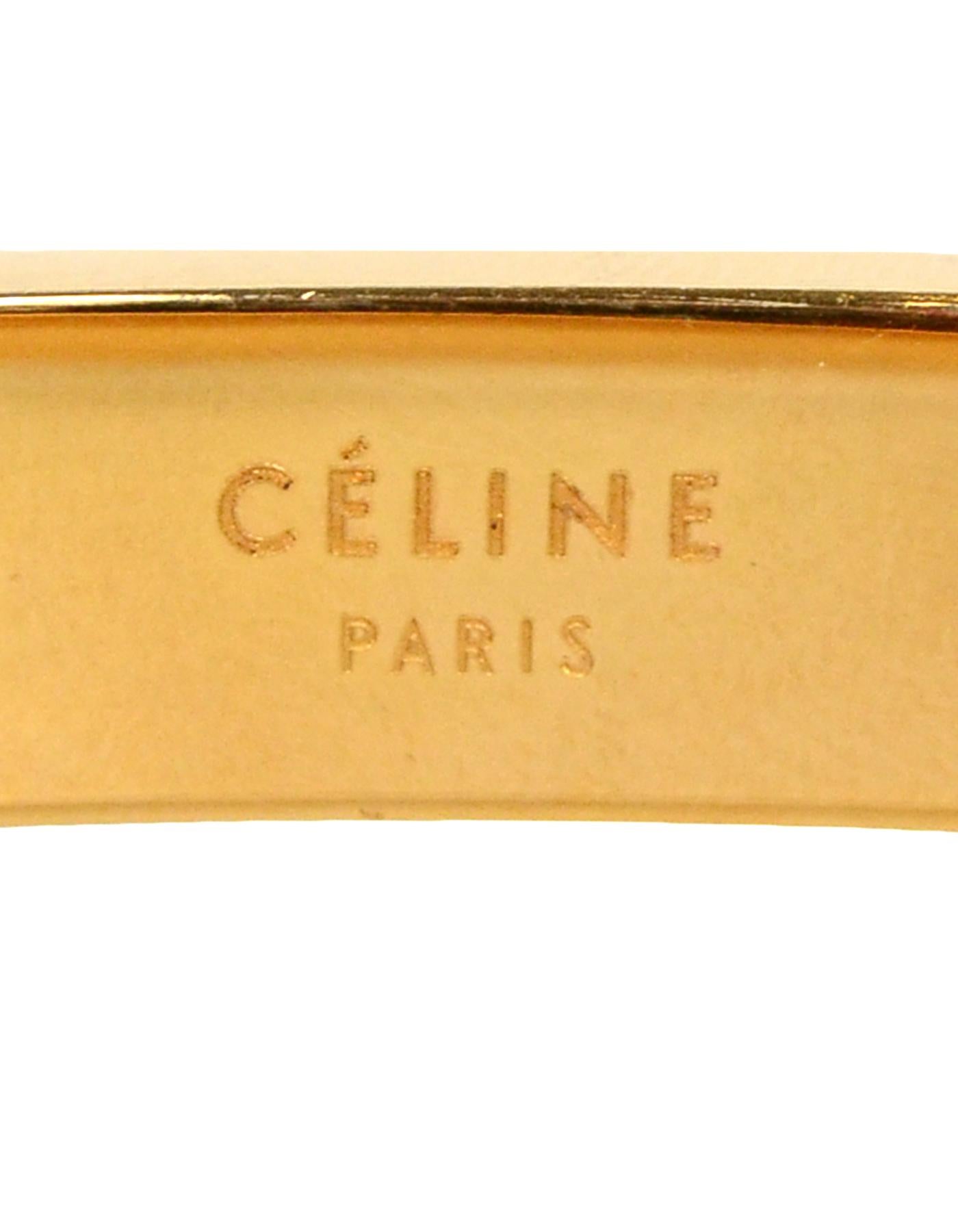 Celine Goldtone Narrow Manchette Cuff Bracelet size Medium In Excellent Condition In New York, NY