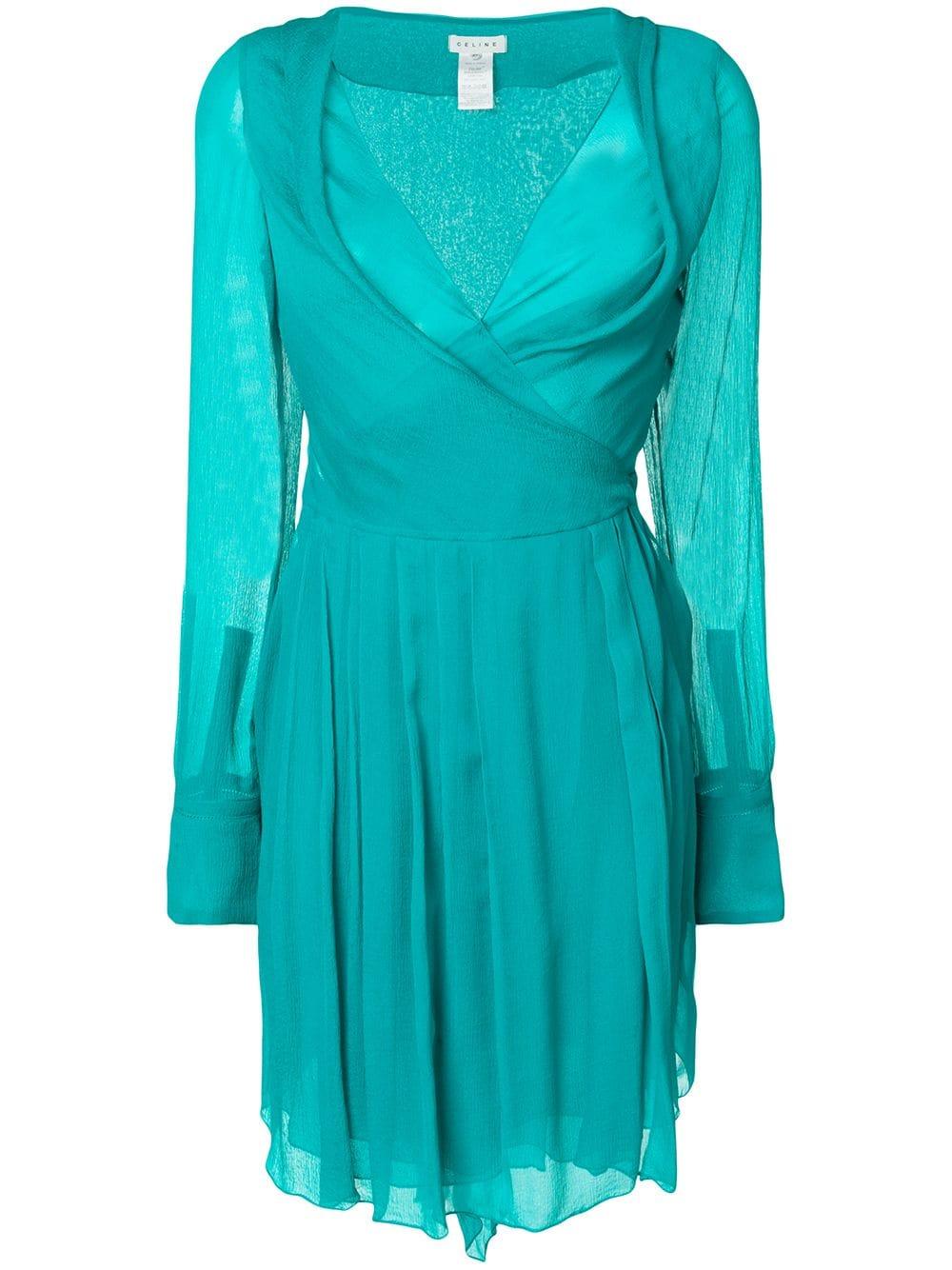 Celine Paris  green silk chiffon wrap cocktail dress featuring a long tie belt, a short length. 
100% silk
Estimated size 38fr/US8/UK12
We guarantee you will receive this gorgeous item as described and showed on photos. (please enlarge images to see