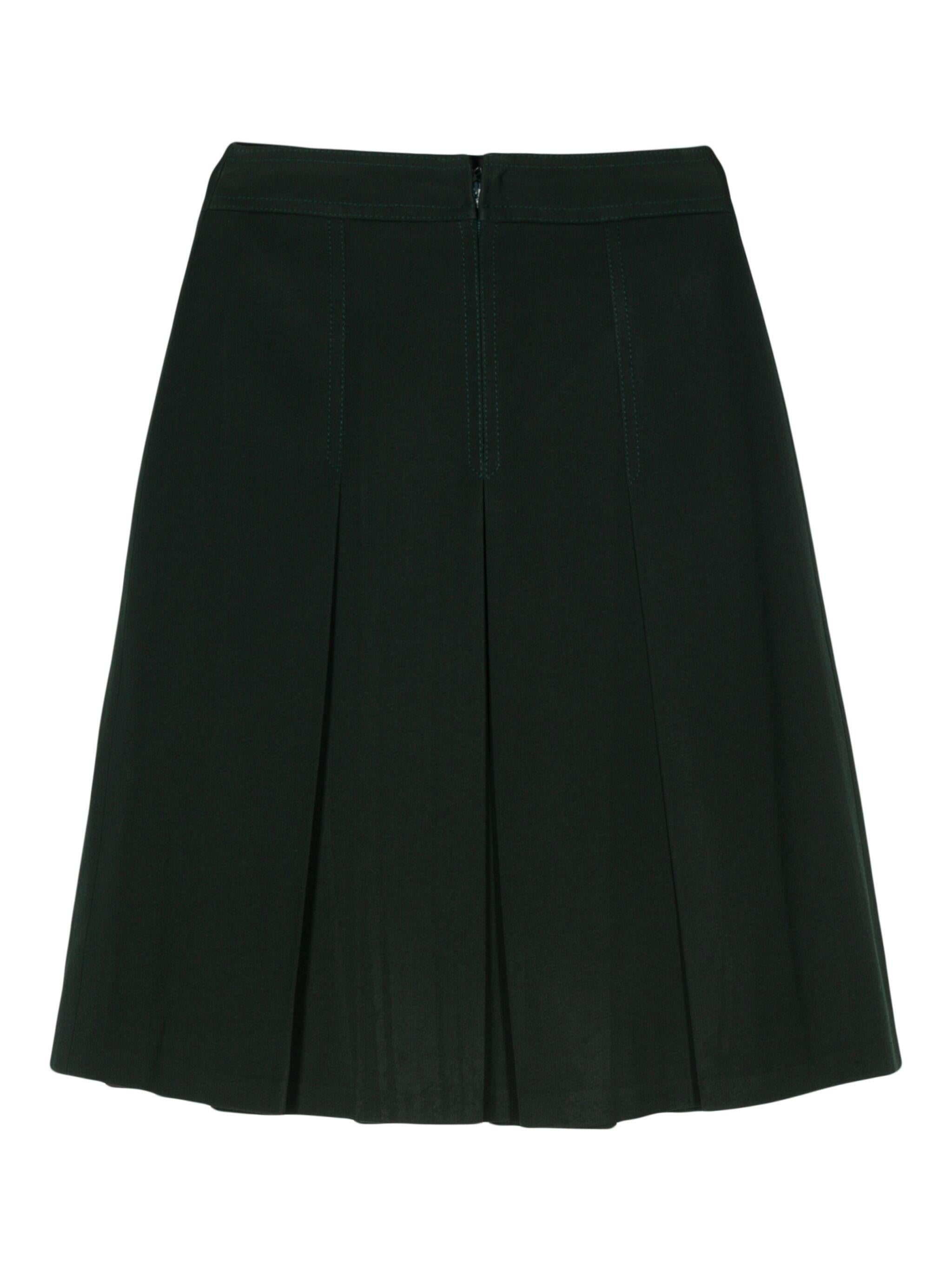 Celine 1970s green wool Horsebit pleated skirt featuring fully pleated, Horsebit detail, A-line, high-waisted, concealed rear zip fastening, straight hem and belted waist with iconic leather detail.
100% wool
Estimated size 38fr/US6 /UK10
In Good