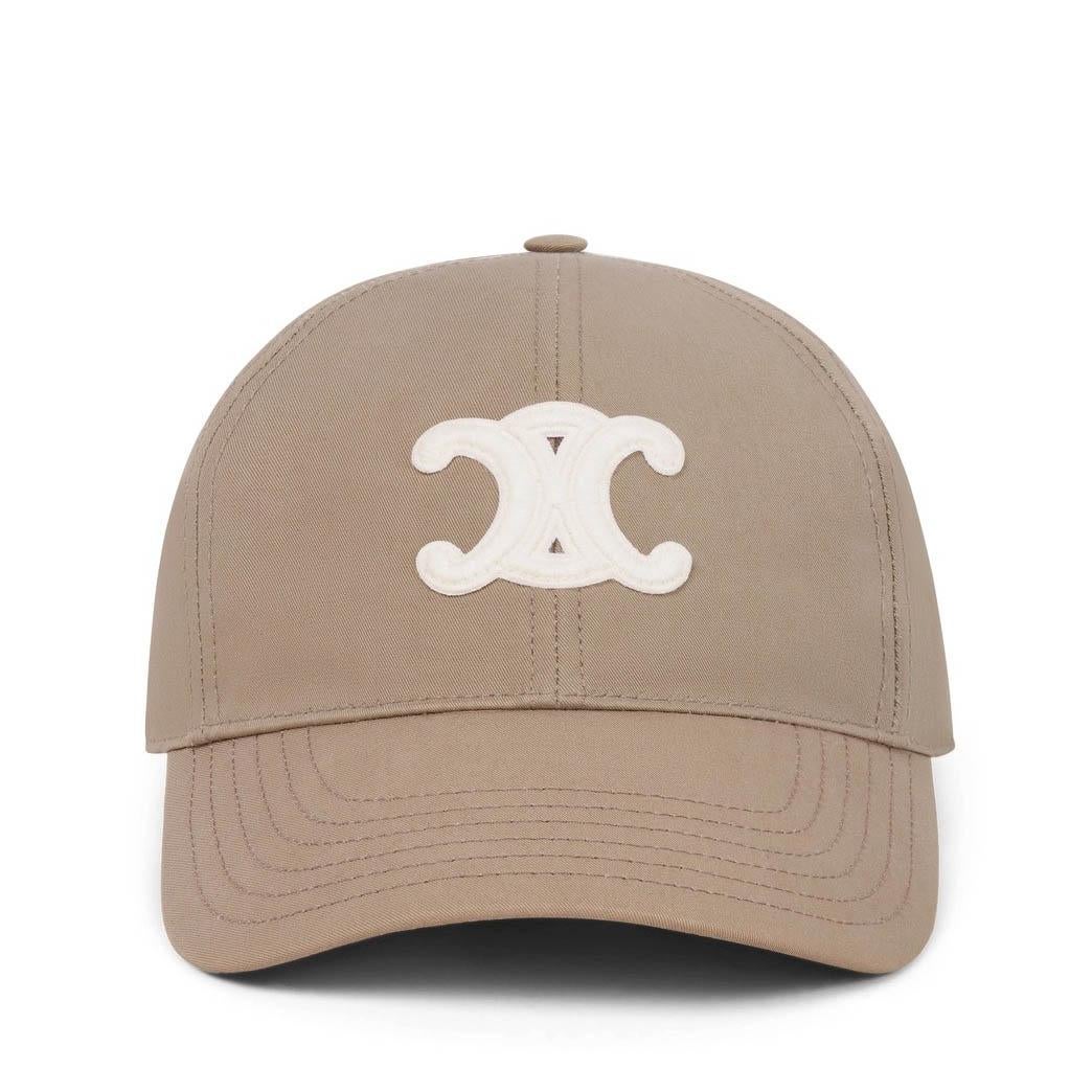 This 100% authentic Celine baseball cap in Greige (taupe) gabardine cotton offers a chic, casual style. It features a white Triomphe patch on the front for a signature touch and an adjustable strap for a comfortable, custom fit. A stylish accessory