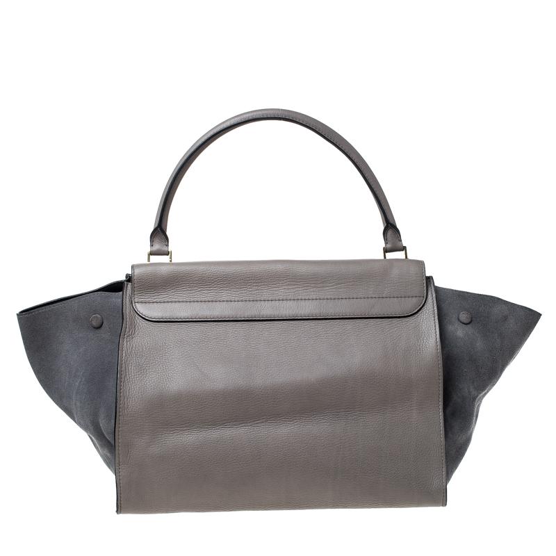 In every stride, swing, and twirl, your audience will gasp in admiration at the beautiful sight of this Celine bag. Crafted from suede and leather in Italy, the bag has a style that will catch glances from a mile. It has been designed with the