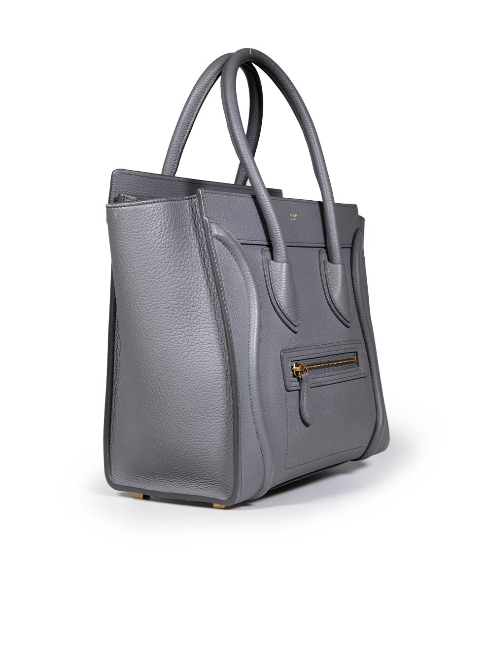 CONDITION is Very good. Minimal wear to the bag is evident, there are light abrasions on the bottom base corners, the front and back swirl panels and the back hanger loop detail. The hardware stoppers on the bottom of the bag are tarnished and there
