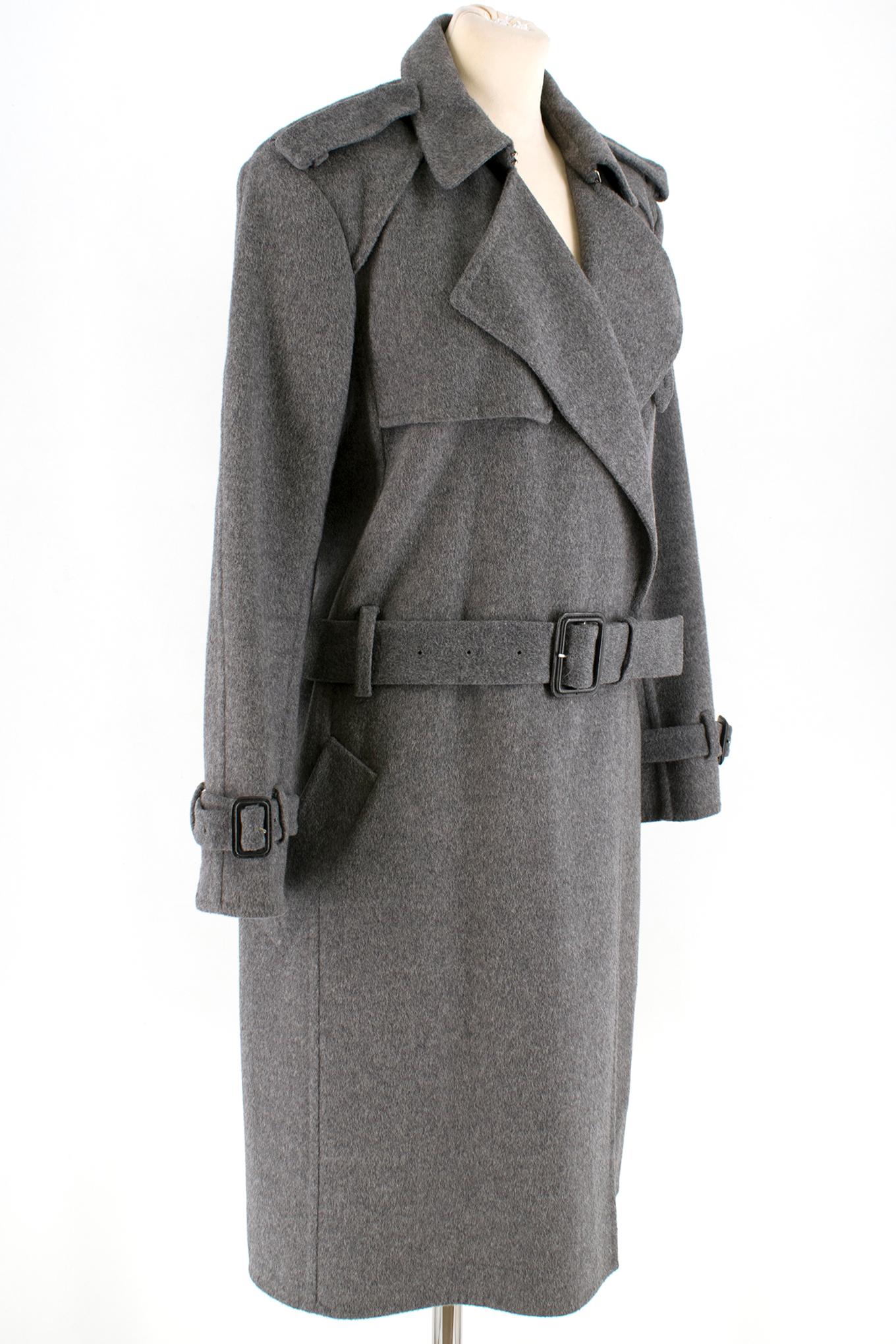 Celine Grey A-Line Belted Coat

Long Wool-blend coat 
Belt tied at the waist 
Two exterior pockets 
Point collar 
Cuff with tie buckle
Tie up buckle around collar 
Neck hook closure
Black interior lining in arms 
Back and front gun lap 

Please