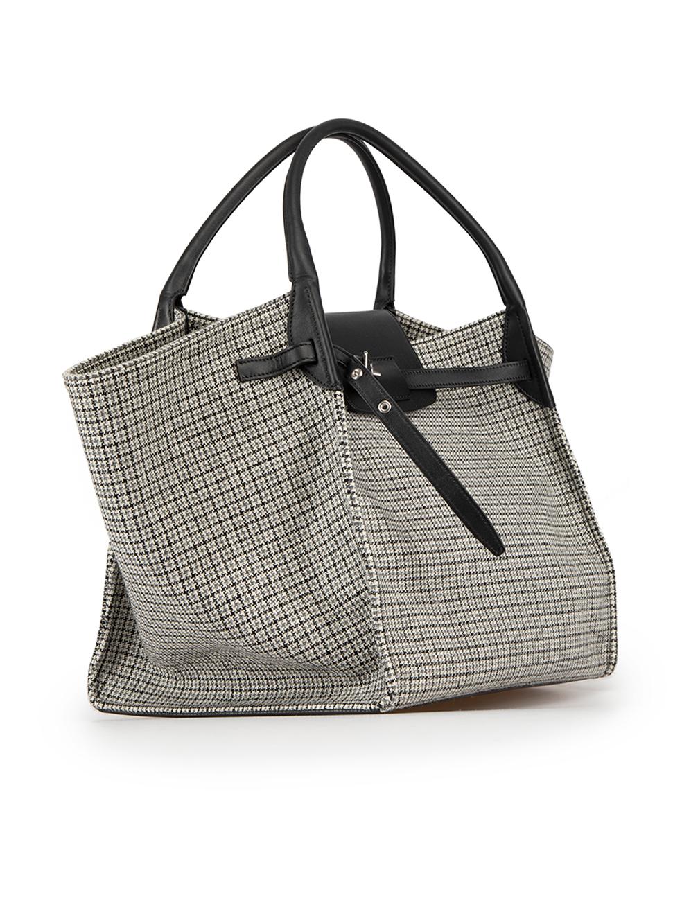 CONDITION is Very good. Minimal wear to tote is evident. Minimal scratching to leather fastening and minor creasing to outer base of bag on this used C√©line¬†designer resale item.
 
Details
Big bag
Grey
Wool
Large tote bag
Houndstooth pattern
Black