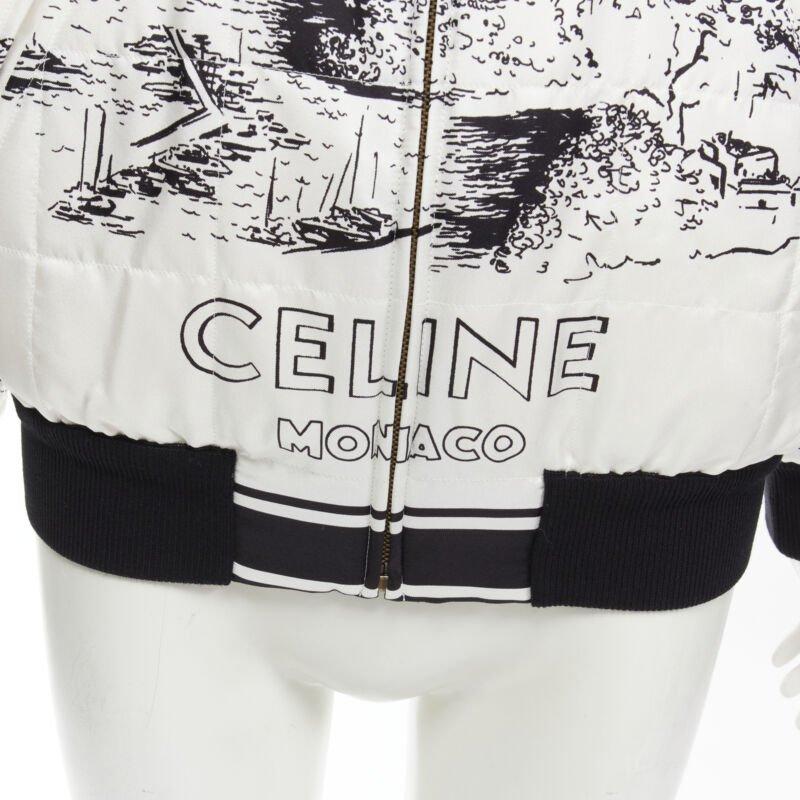 CELINE Hedi Slimane Runway Casaque white silk foulard reversible bomber FR34
Reference: AAWC/A00122
Brand: Celine
Designer: Hedi Slimane
Model: 2V21E604N
Collection: Spring Summer 2021 - Runway
Material: 100% Silk
Color: White, Black
Pattern: