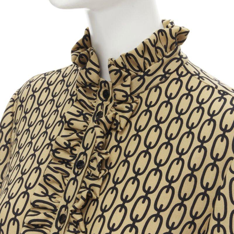 CELINE Hedi Slimane Triomphe chain wool frill collar pleated dress FR38 S
Reference: MELK/A00109
Brand: Celine
Designer: Hedi Slimane
Model: Triomphe dress
Material: Wool
Color: Yellow, Black
Pattern: Chain
Closure: Button
Lining:  Silk
Extra