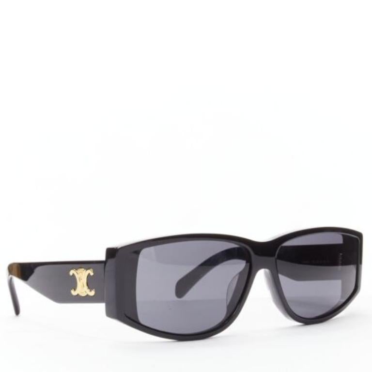 CELINE Hedi Slimane Triomphe CL40227U black gold logo acetate sunglasses
Reference: JYLM/A00050
Brand: Celine
Designer: Hedi Slimane
Model: CL40227U
Material: Acetate
Color: Black, Gold
Pattern: Solid
Lining: Black Acetate
Extra Details: Side