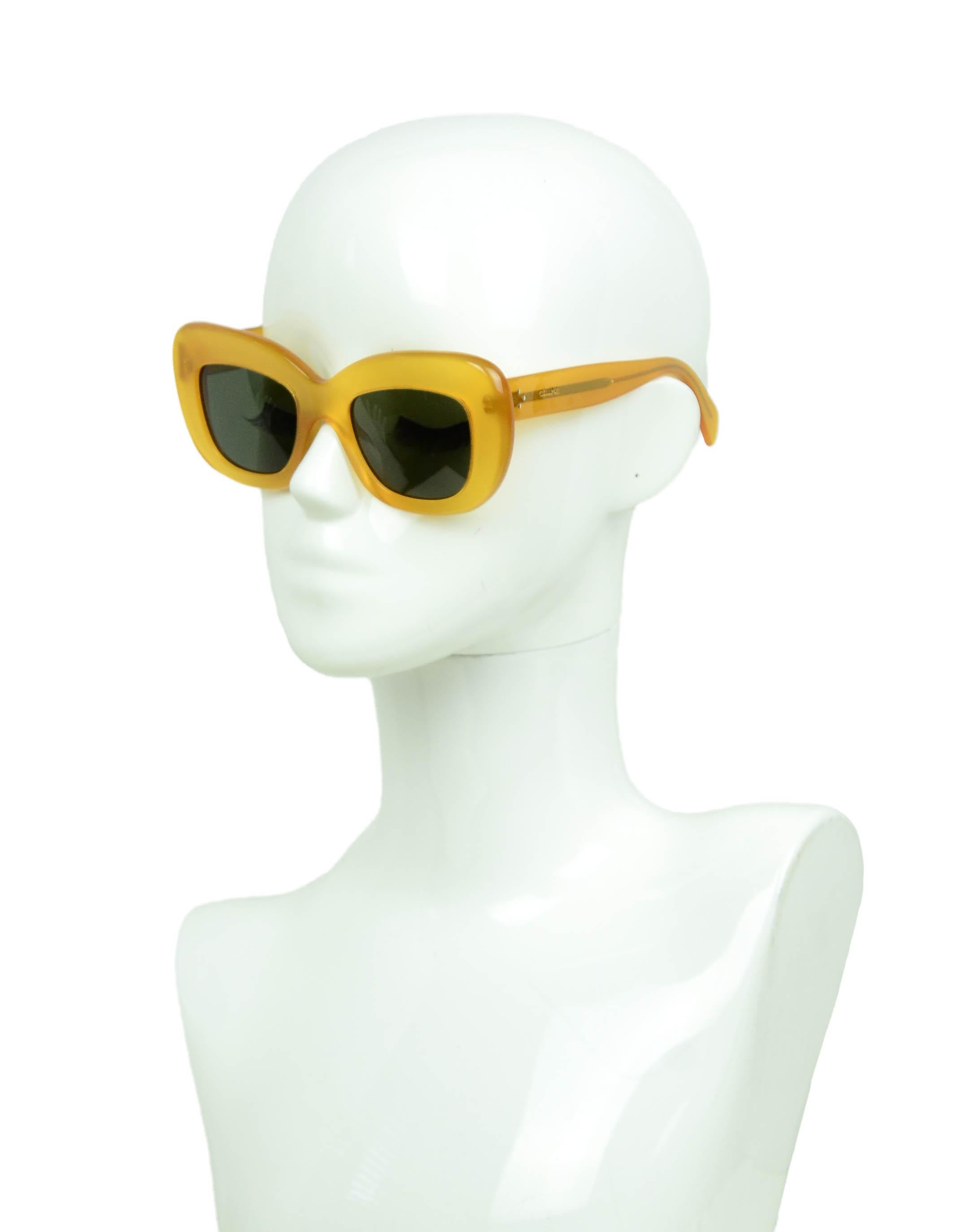 Celine Honey Diane Sunglasses CL41432/S

Made In: Italy
Color: Honey
Hardware: Silvertone
Materials: Resin
Overall Condition: Very good/excellent - hairline scratches on frames
Includes: Case

Measurements:
Length Across Front: 6”
Height: 2.25
Lens: