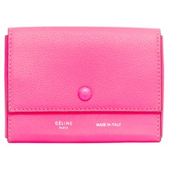 CELINE hot pink grained leather silver logo 4 fold flap wallet