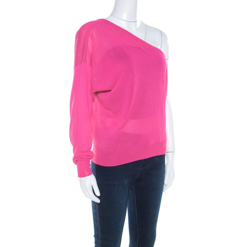 Cut to a stylish silhouette with one shoulder design, this Celine top is a must-have. It comes in hot pink with one long sleeve. The top will work best with a tube top underneath, regular jeans, high heels, and a small shoulder bag.

Includes: The