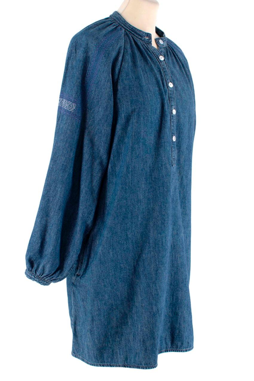  Celine Indigo Denim Embroidered Peasant Tunic 
 

 - Celine by Hedi Slimane
 - Lightweight indigo denim tunic, with the option to wear as an oversized blouse or short dress
 - Grandad collar with 5 button 1/2 placket
 - Gathered ragaln sleeves with