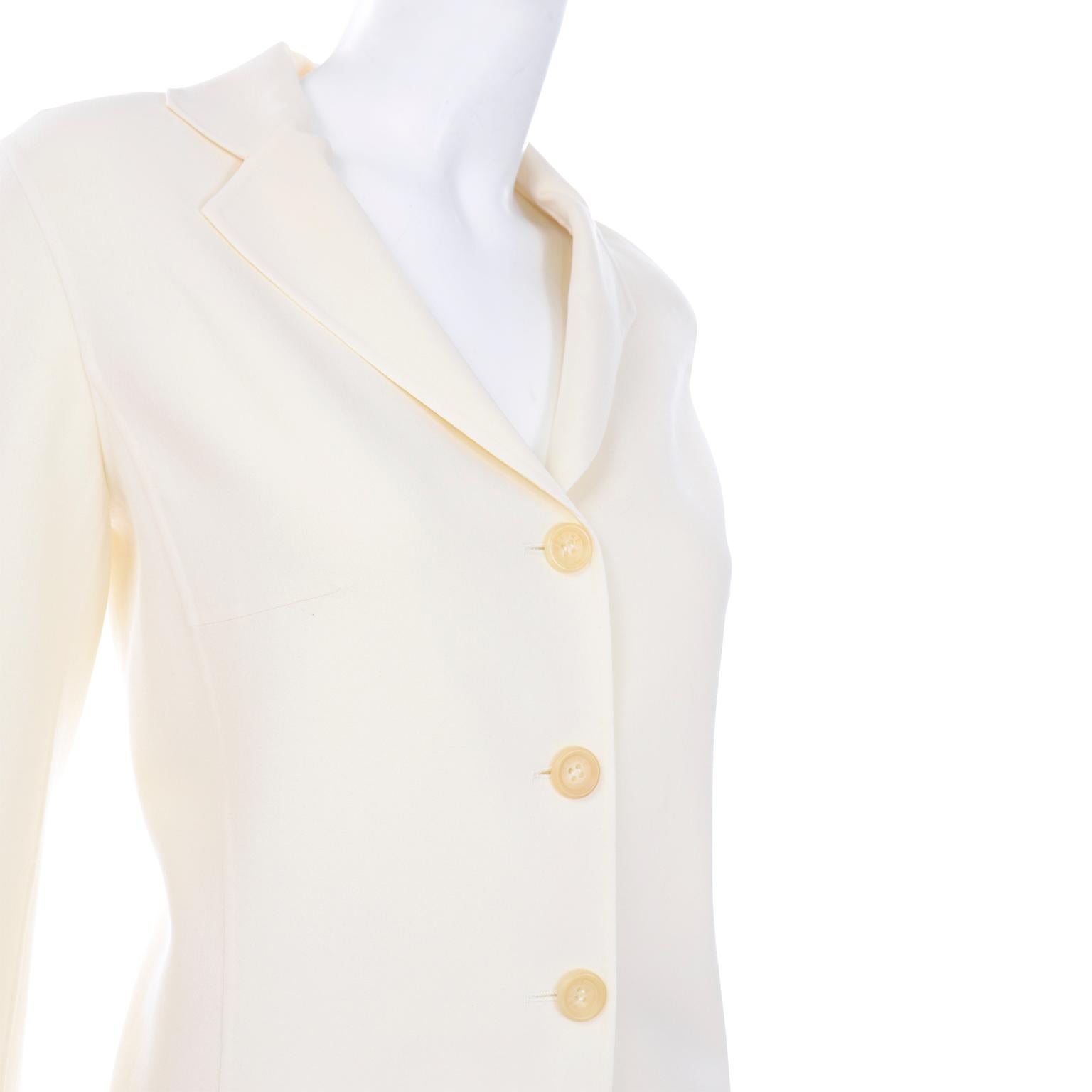 This is a really lovely creamy ivory Celine skirt and jacket suit with pretty seam details. We love this suit because the fabric  is super soft and lightweight, so it's a great option for warmer climates! You can wear the pieces as separates with