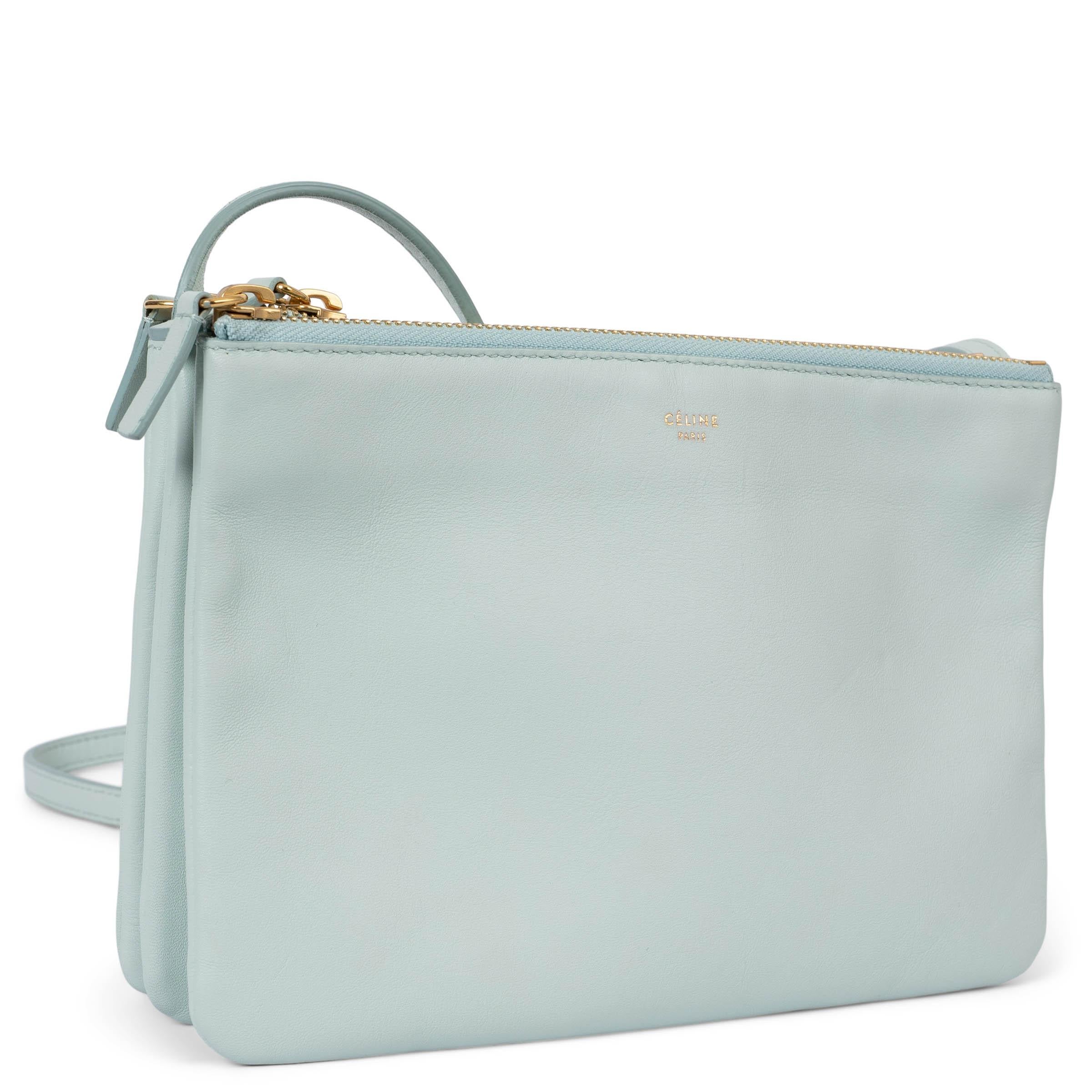 100% authentic Céline Trio Small shoulder bag in smooth pale jade green lambskin. Can be carried cross-body or on your shoulder. Three separate zipper compartments attached together with snap-buttons. Lined in grey jersey fabric. Can be carried as a