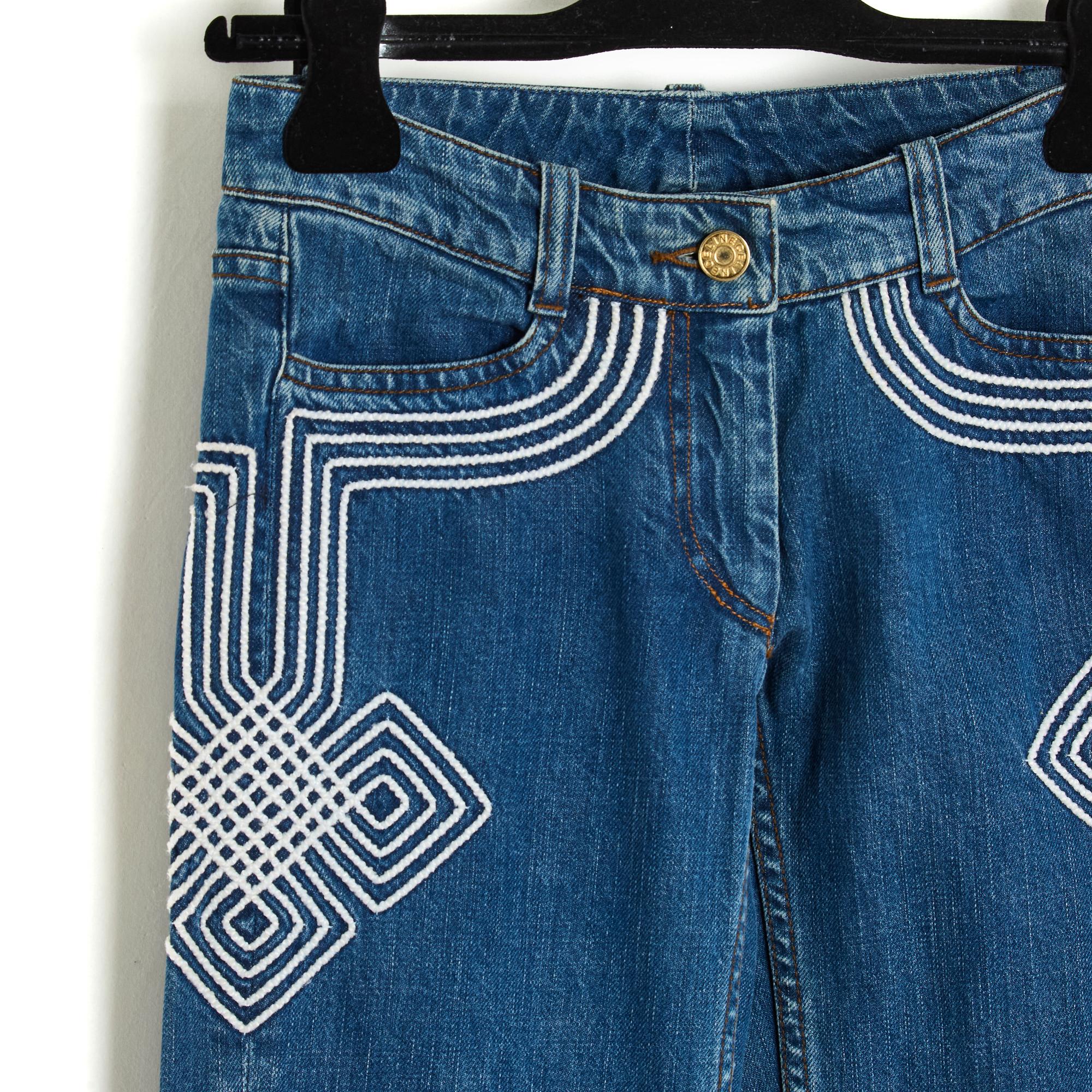 Celine jeans circa 2000 by Michael Kors in 100% cotton denim fabric (elastane free) embroidered with an ecru geometric pattern on each side, very low waist, straight cut with flare tendency (once the jeans are ironed with a pleat in front), pockets
