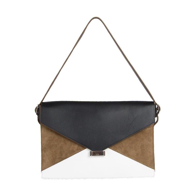 Celine 'Diamond' shoulder bag in black and white leather and olive green suede.  Zipper pocket on the outside back. Closes with a lock on the front. Inside is divide into two compartements. Lined in black leather with a zipper pocket against the