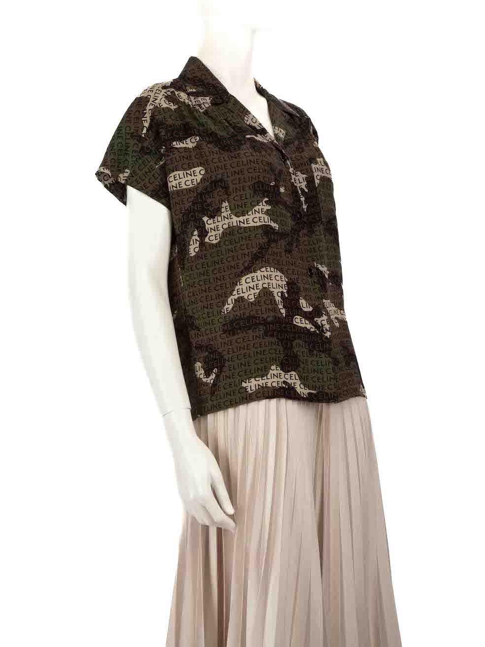 CONDITION is Very good. Hardly any visible wear to top is evident on this used Céline designer resale item.
 
 
 
 Details
 
 
 Khaki
 
 Silk
 
 Blouse
 
 Camo and logo print
 
 Short sleeves
 
 Button up fastening
 
 V-neck
 
 
 
 
 
 Made in
