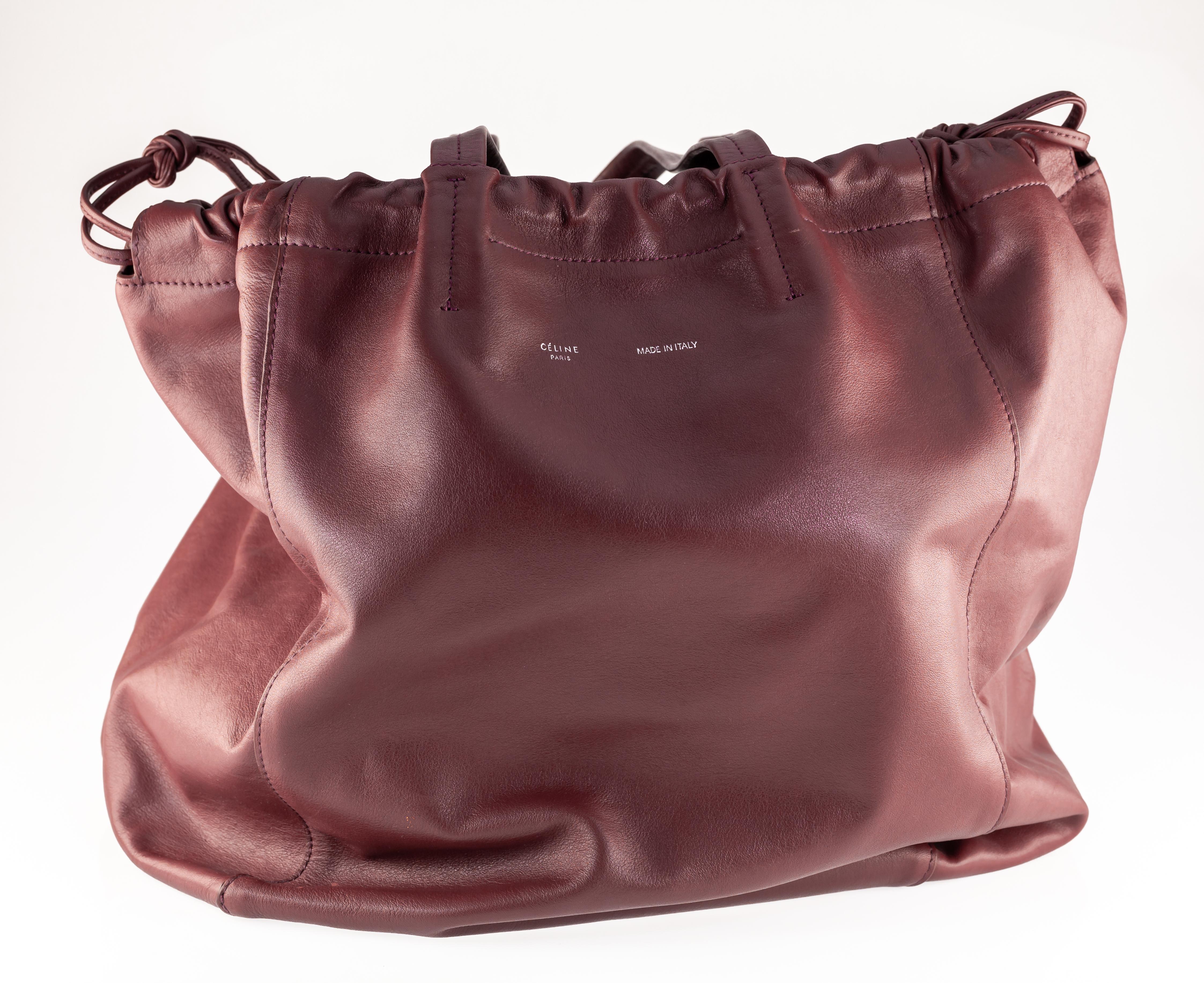 Céline Large Coulisse Shoulder Bag Burgundy Calf Leather Retail $2350 & Dust Bag

Gorgeous Calf Leather Shoulder Bag by Celine
From 2016 Collection by Phoebe Philo
Features Calf Skin Exterior and Suede Interior
Bag is in Good Used Condition. Some