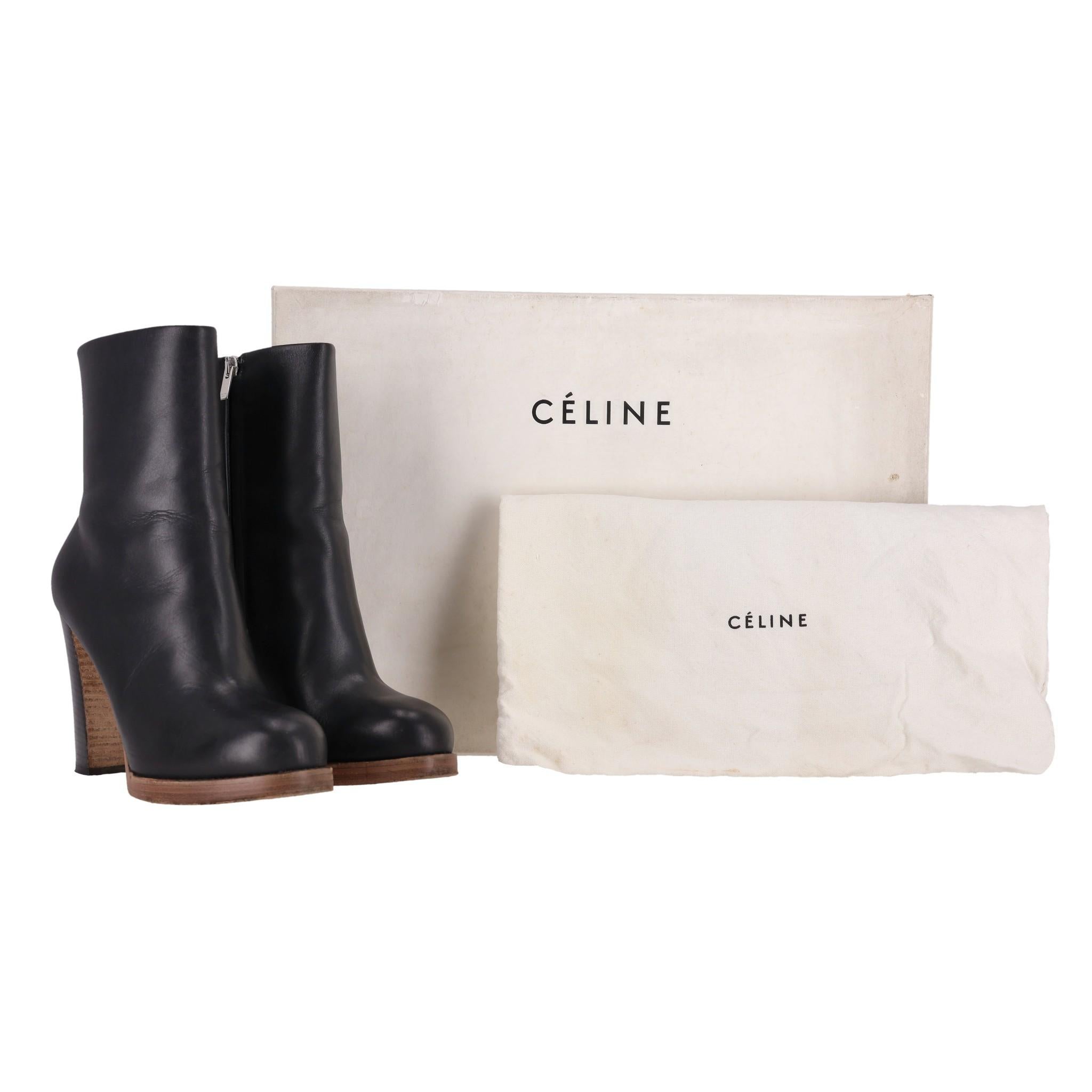 Celine Leather Ankle Boots

Black boots crafted from leather with a round toe and high block heel.

Featuring zip fastening to the side and leather lining.

Rrp Approx. £1,000

Size – 36.5

Condition – Very Good (Light scratches and signs of