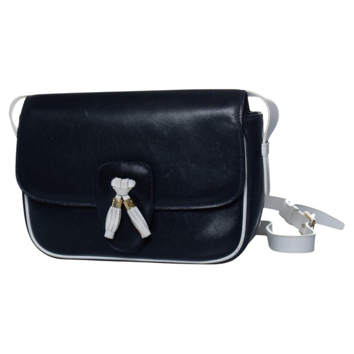 Celine, Leather black tassel bag with white details For Sale