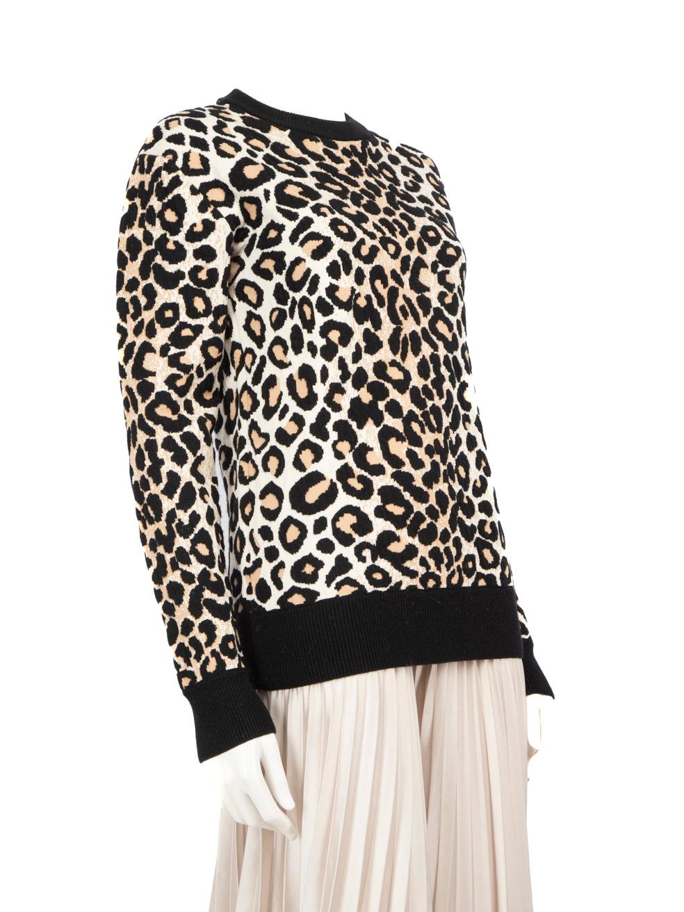 CONDITION is Very good. Minimal wear to the jumper is evident. Light pilling across this used Céline designer resale item.
 
 Details
 
 
 Beige 
 
 Wool
 
 Jumper
 
 Leopard print
 
 Stretchy
 
 Black rib knit trim
 
 
 
 
 
 Made in Italy
 
 
 
