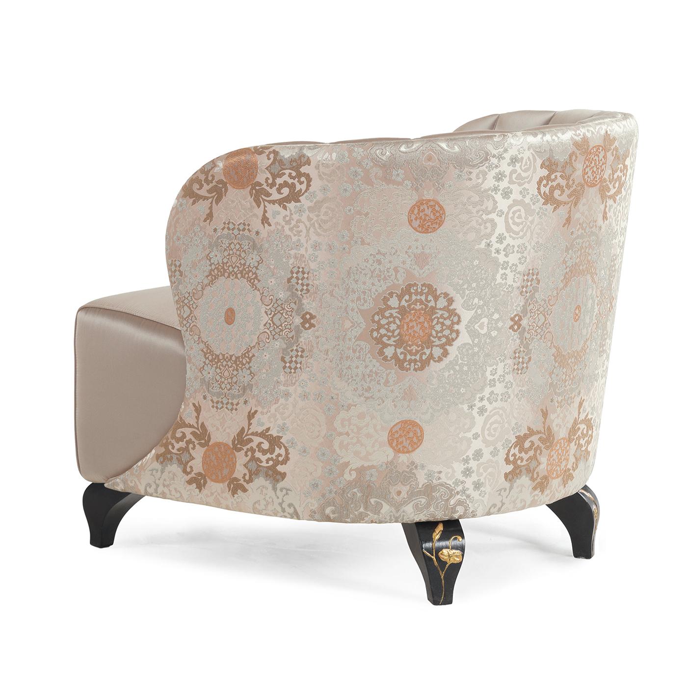 A magnificent piece of functional decor, this armchair will be a superb addition to an entryway, bedroom, or living room, where it can be also placed in the center of the room, to display the stunning decorations gracing its back and armrests. The