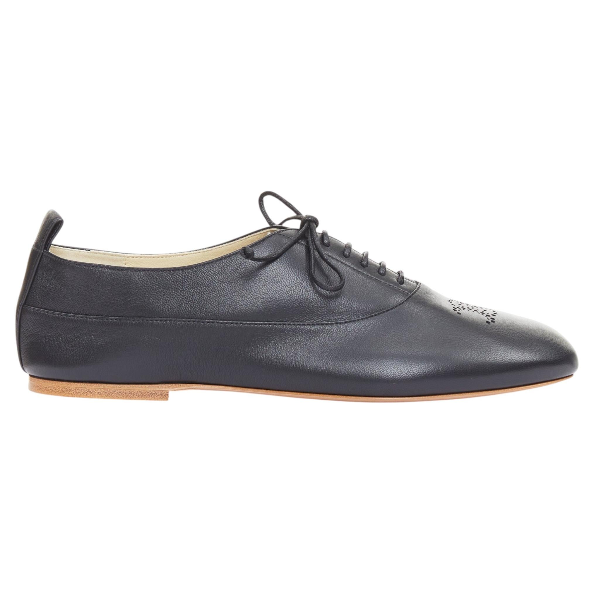 Mocasines CELINE Lise Triomphe Richelieu negros, de piel lisa y perforada, con suela plana, talla 39 en venta