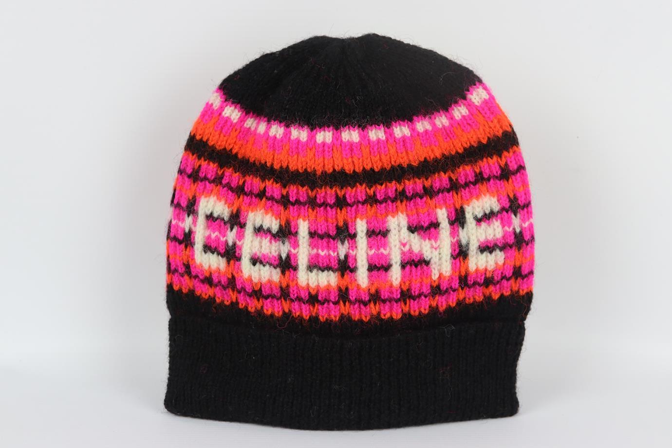 Celine logo jacquard wool beanie. Black, cream, pink and orange. Slips on. 100% Wool. Does not come with dustbag or box. Size: One Size: Circumference: 17 in. Very good condition - No sign of wear; see pictures.
