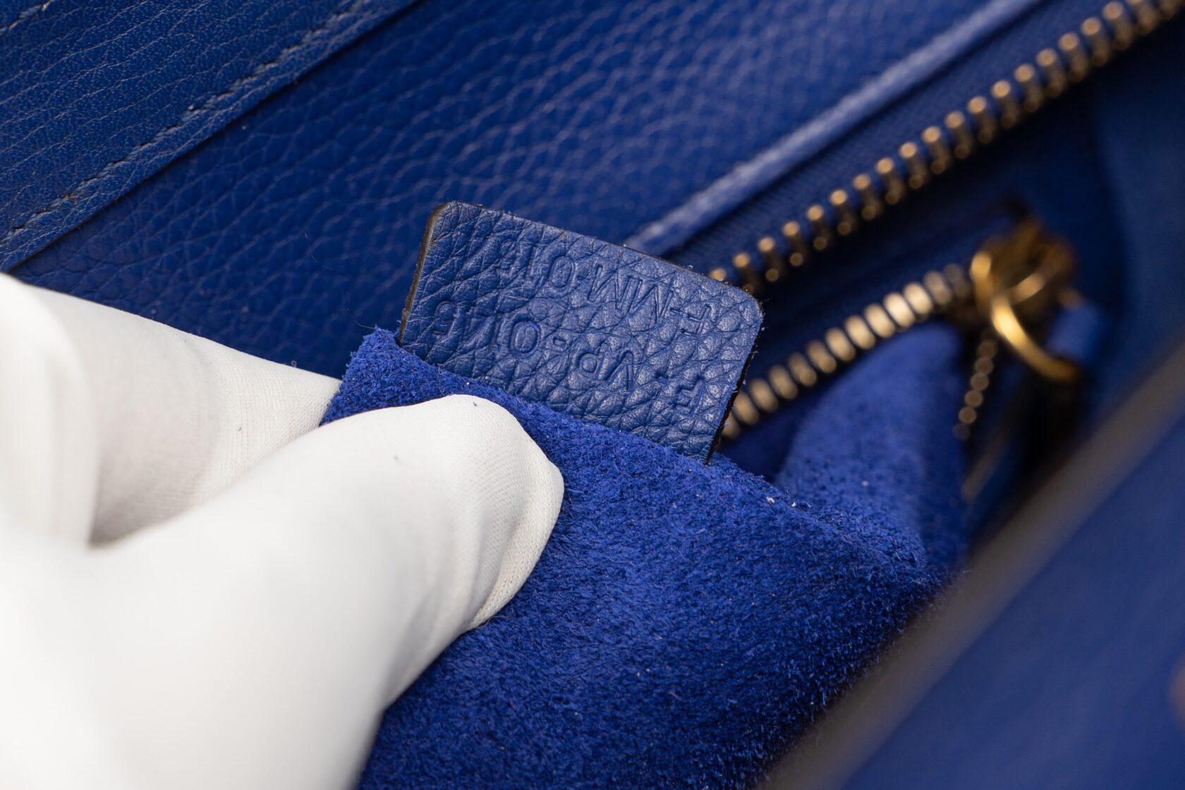 SIZE: 27/27/11 cm
COLOUR: Blue
HARDWARE: Gold-tone metal
SERIAL NUMBER: F-NP-0145 F-MM-0154
SET: Nothing, just a bag
YEAR: 2014
CONDITION: A: Excellent condition with few signs of use; carefully kept.
NOTE: The color of the bag is professionally