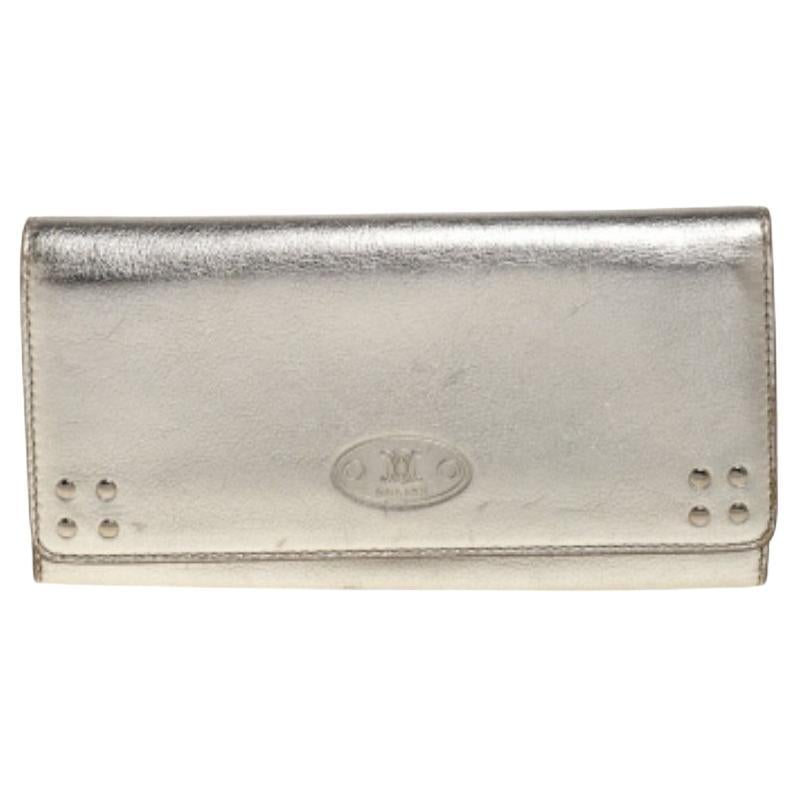 Portafoglio continentale Celine con patta in pelle oro metallizzato in vendita