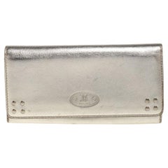 Portafoglio continentale Celine con patta in pelle oro metallizzato