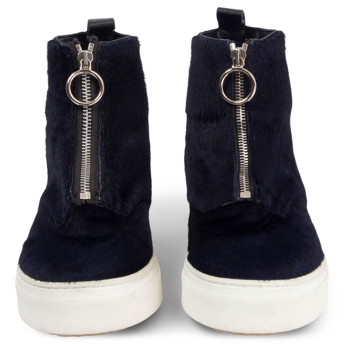 100% authentic Céline high-top sneakers in midnight blue calf hair featuring leather lining and silver-tone zipper detail. Brand new. Come with dust bag. 

Measurements
Imprinted Size	39
Shoe Size	39
Inside Sole	26cm (10.1in)
Width	7.5cm