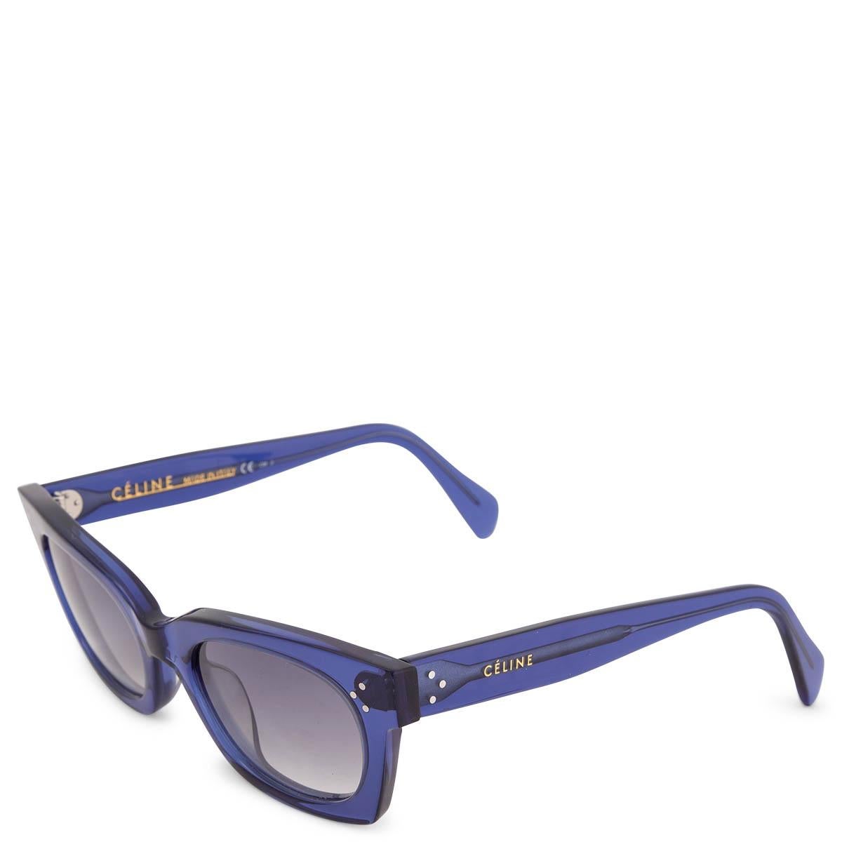 100% authentic Celine CL 41029/S Sofia sunglasses in midnight blue acetate with light black lenses. Embellished with gold-tone studs around the frame. Have been worn and have some barely visible scratches, otherwise in excellent condition. Come with