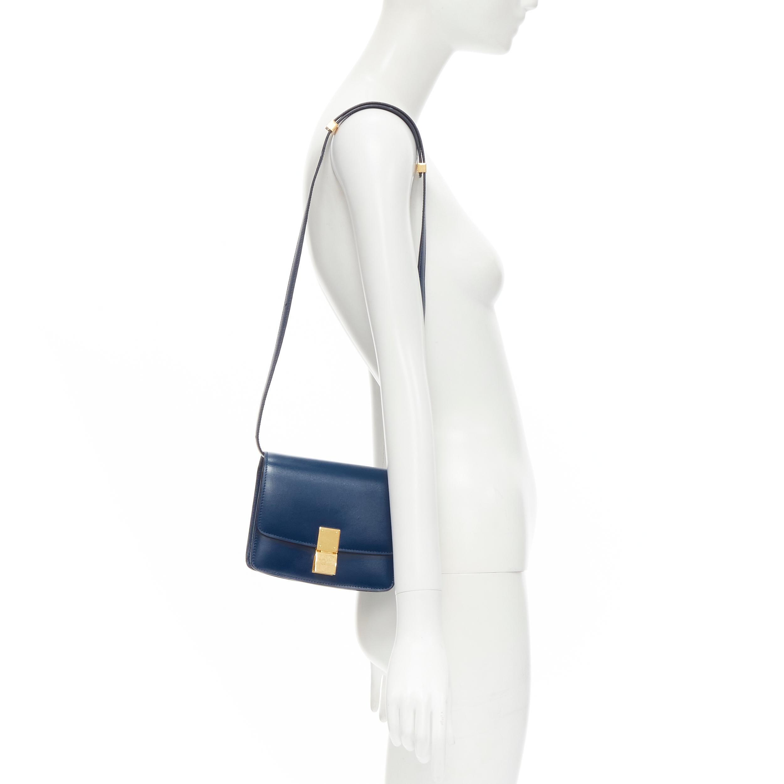 CELINE Mini Classic Box Amazone blue smooth lambskin crossbody flap bag 
Reference: LNKO/A01907 
Brand: Celine 
Designer: Phoebe Philo 
Model: Mini Classic 
Material: Leather 
Color: Blue 
Pattern: Solid 
Closure: Clasp 
Extra Detail: Amazone blue